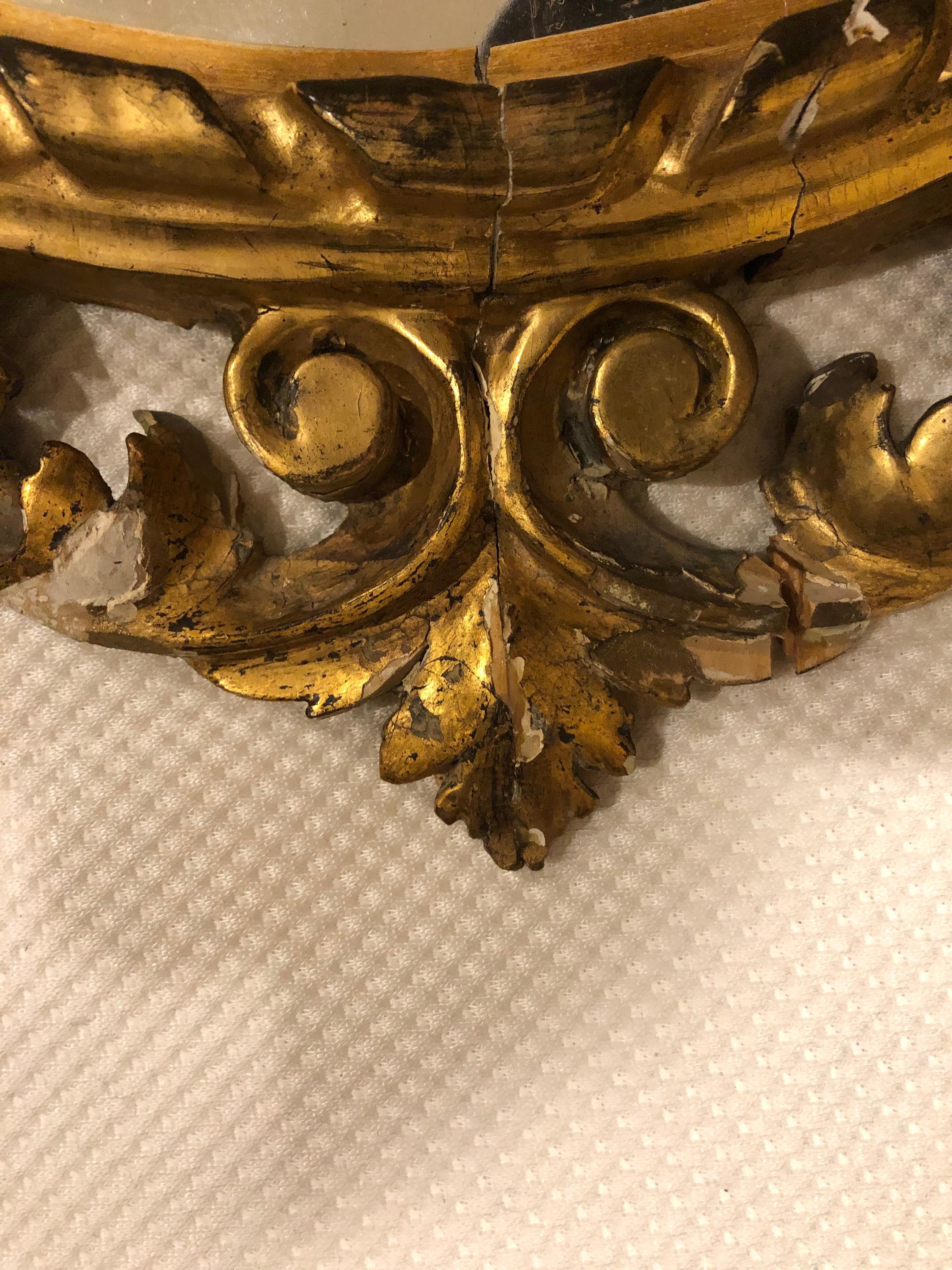 Beautiful Rococo style mirror, Germany, circa 1860-1870, giltwood beautifully carved. The mirror needs some refinishing