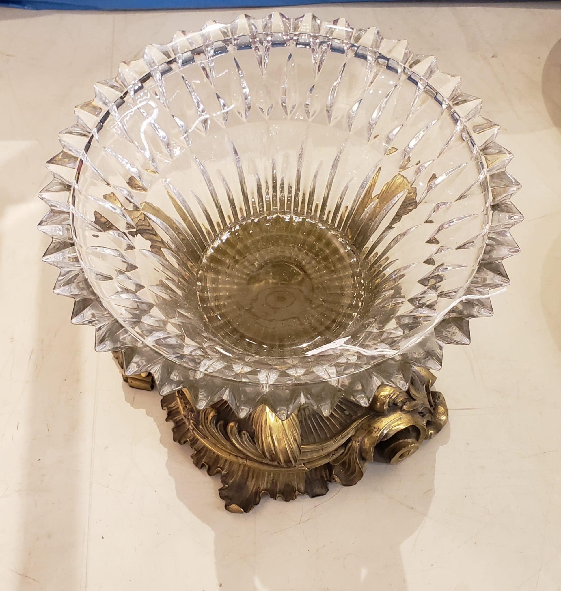 A Rococo Style Molded crystal Glass Mounted Patinated Metal and Brass Centerpiece. Measures 12