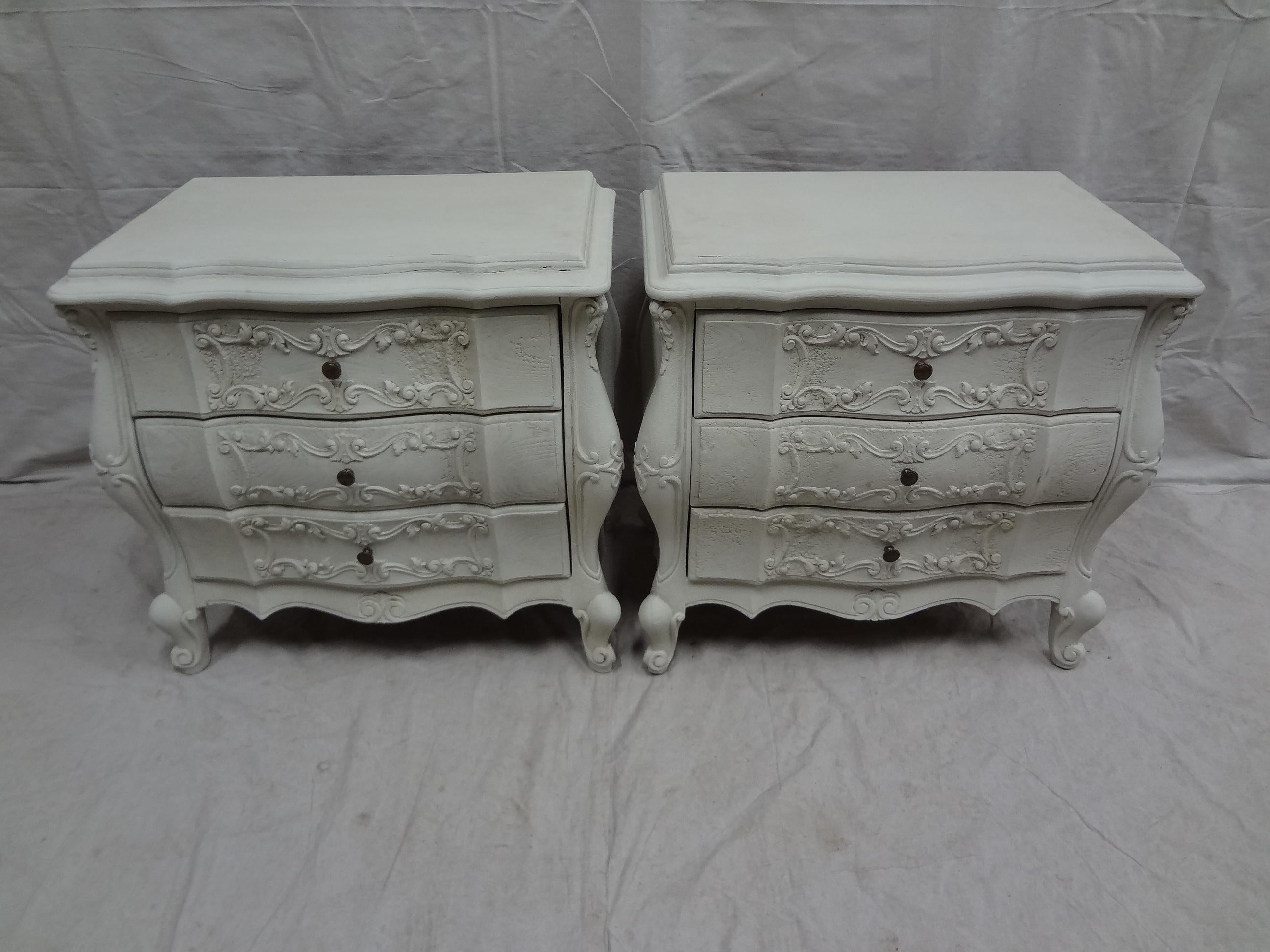This is a set of 2 Rococo style nightstands. They have been restored and repainted with milk paints 