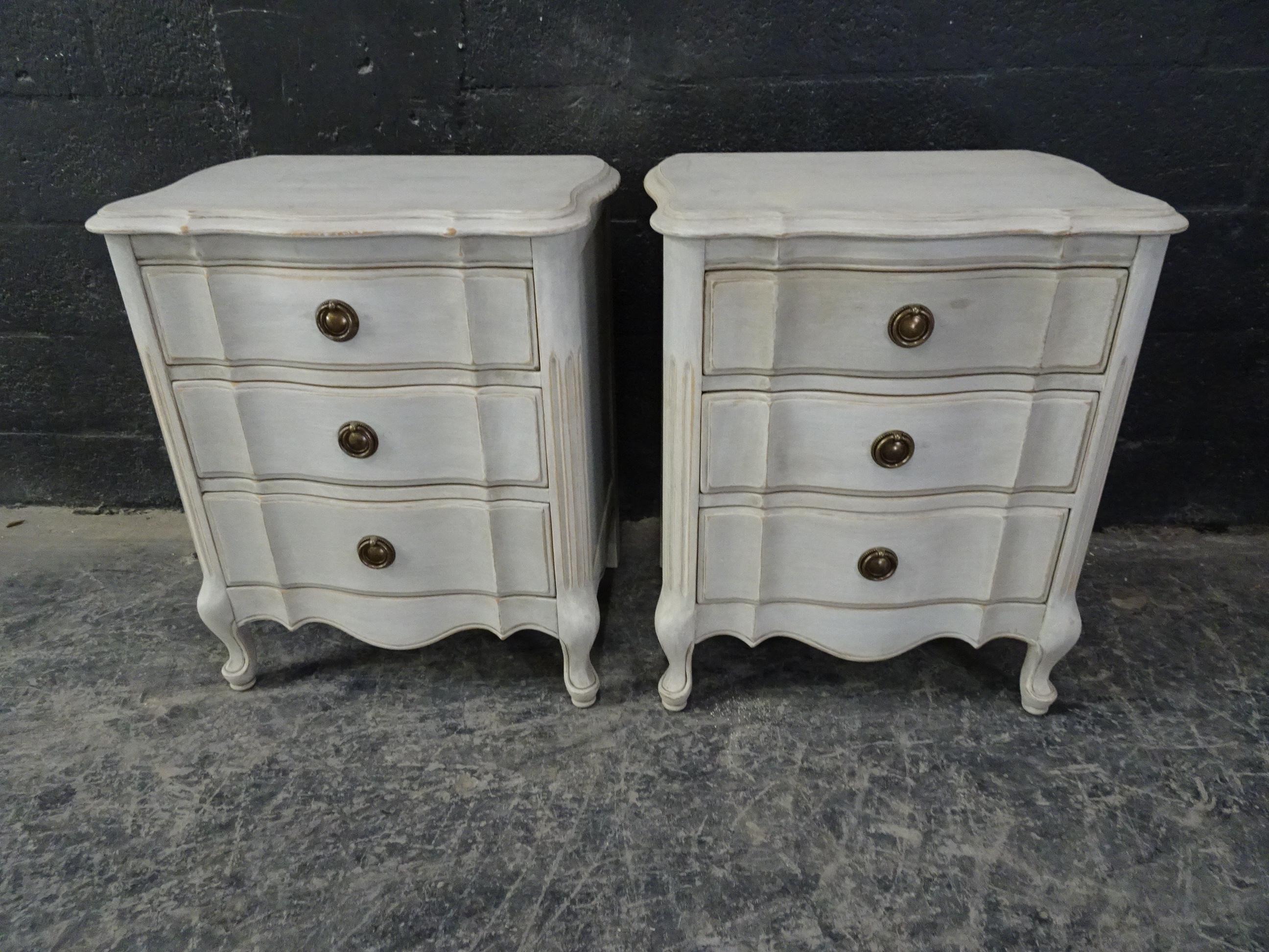 This is a set of 2 Rococo style nightstands. its been restored and repainted with milk paints 