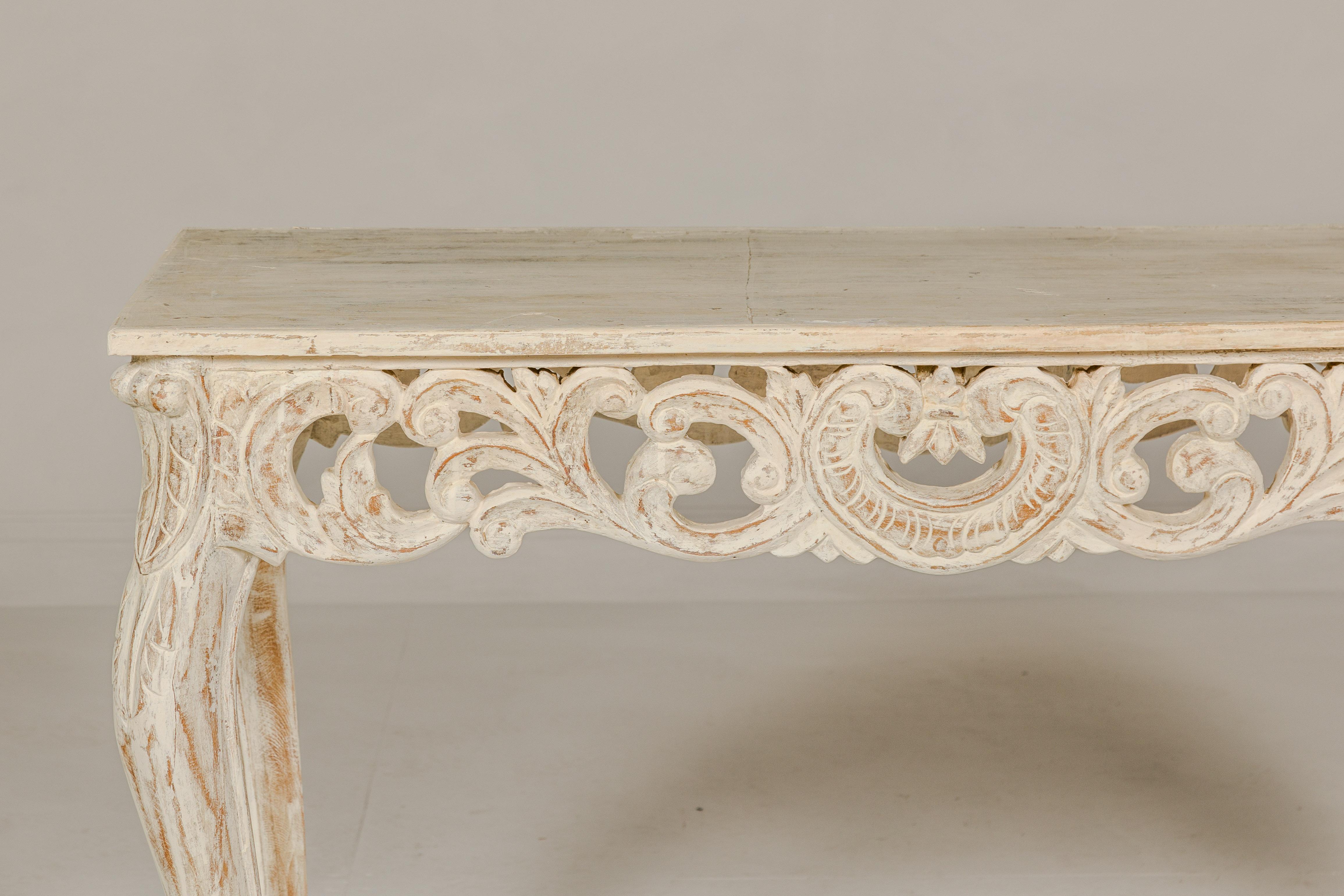 Rococo Style Painted Console Table with Carved Apron and Distressed Finish For Sale 1