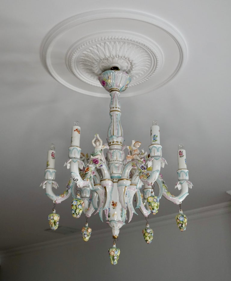 Rare and gorgeous Rococo style porcelain chandelier with Cherub Putti by Tettau Germany, 70 cm, diameter 55 cm. 

This magnificent chandelier is an exceptional example of the Rococo style by the porcelain producer Tettau in Germany.
The