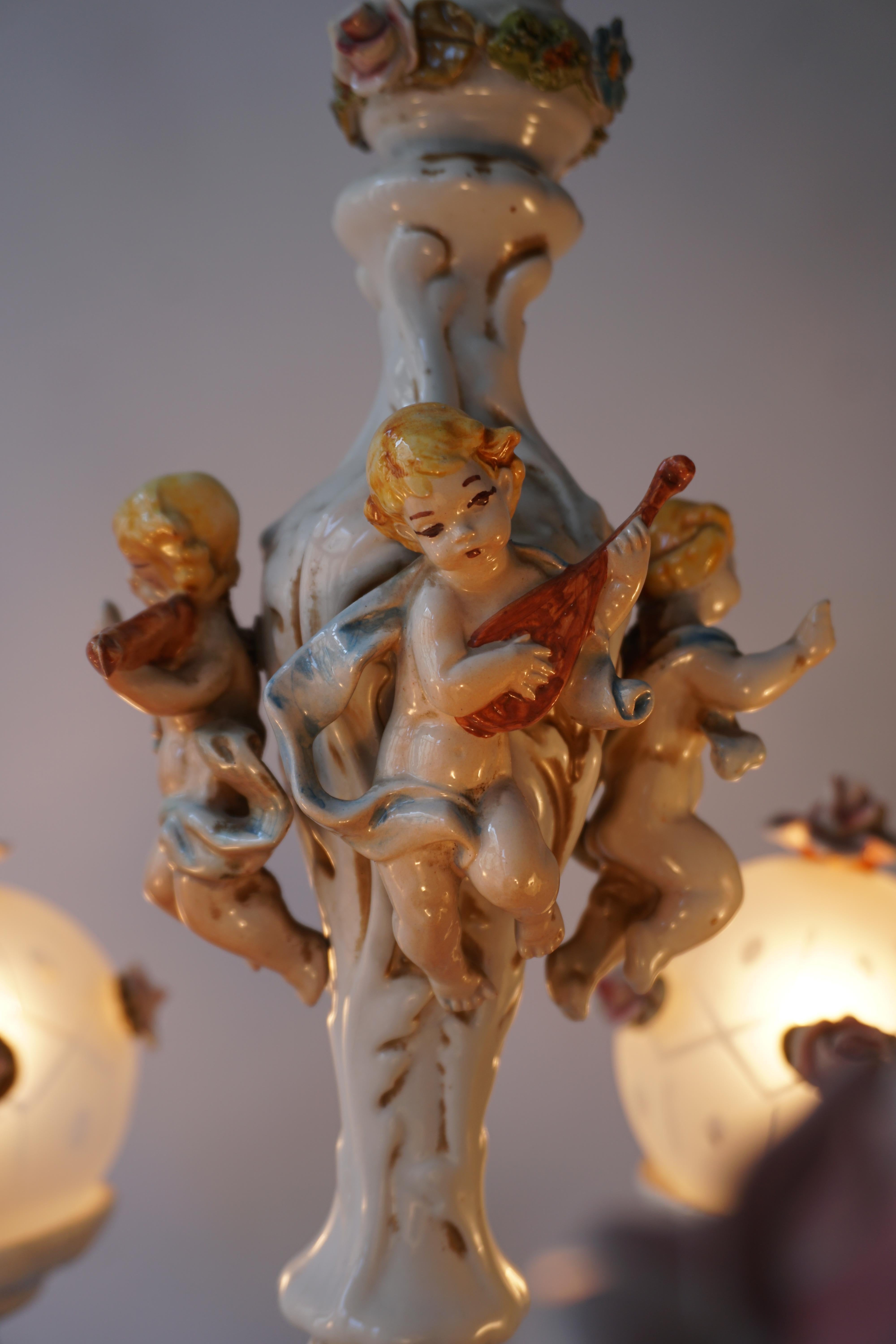 Rococo Style Porcelain Chandelier with Cherubs Playing Instruments For Sale 9