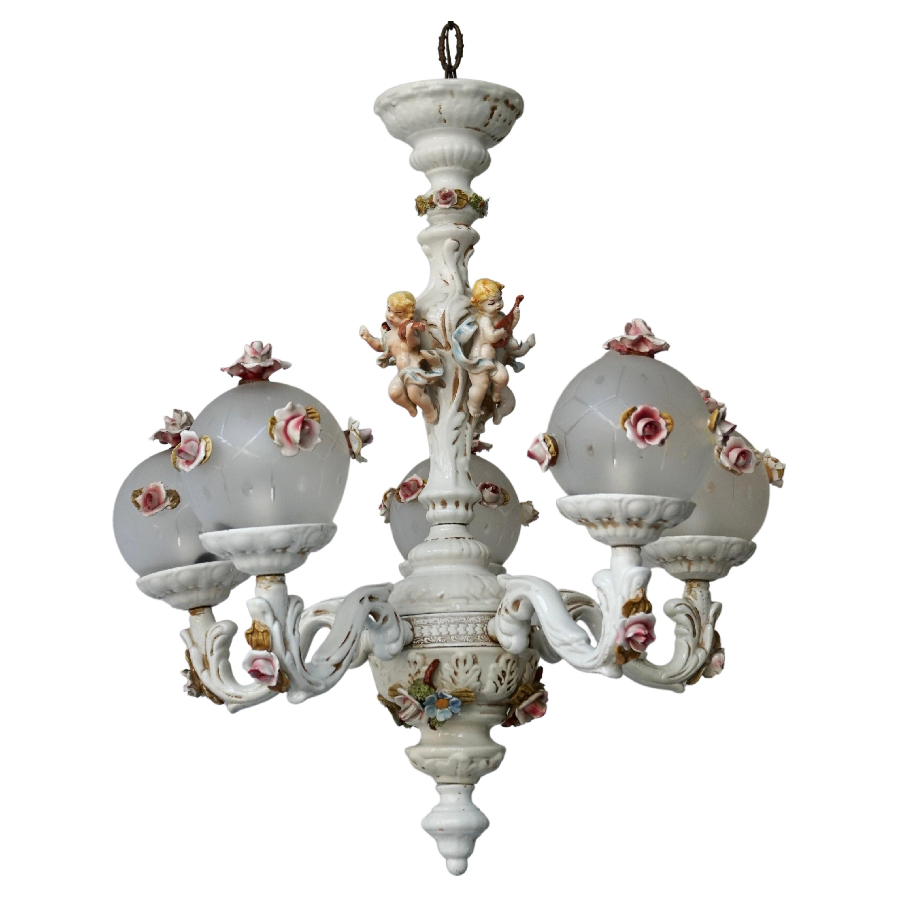 Rococo Style Porcelain Chandelier with Cherubs Playing Instruments For Sale