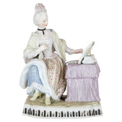 Rococo style porcelain figure of a woman by Meissen