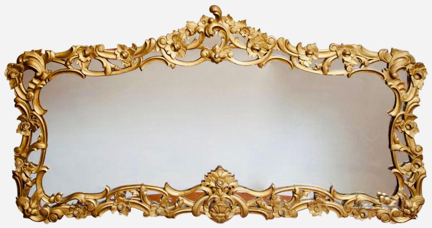 Impressive Rococo style wall, pier, console mirror. A large and impressive over the mantle Gilt wood mirror in a spectacular rococo carved frame.