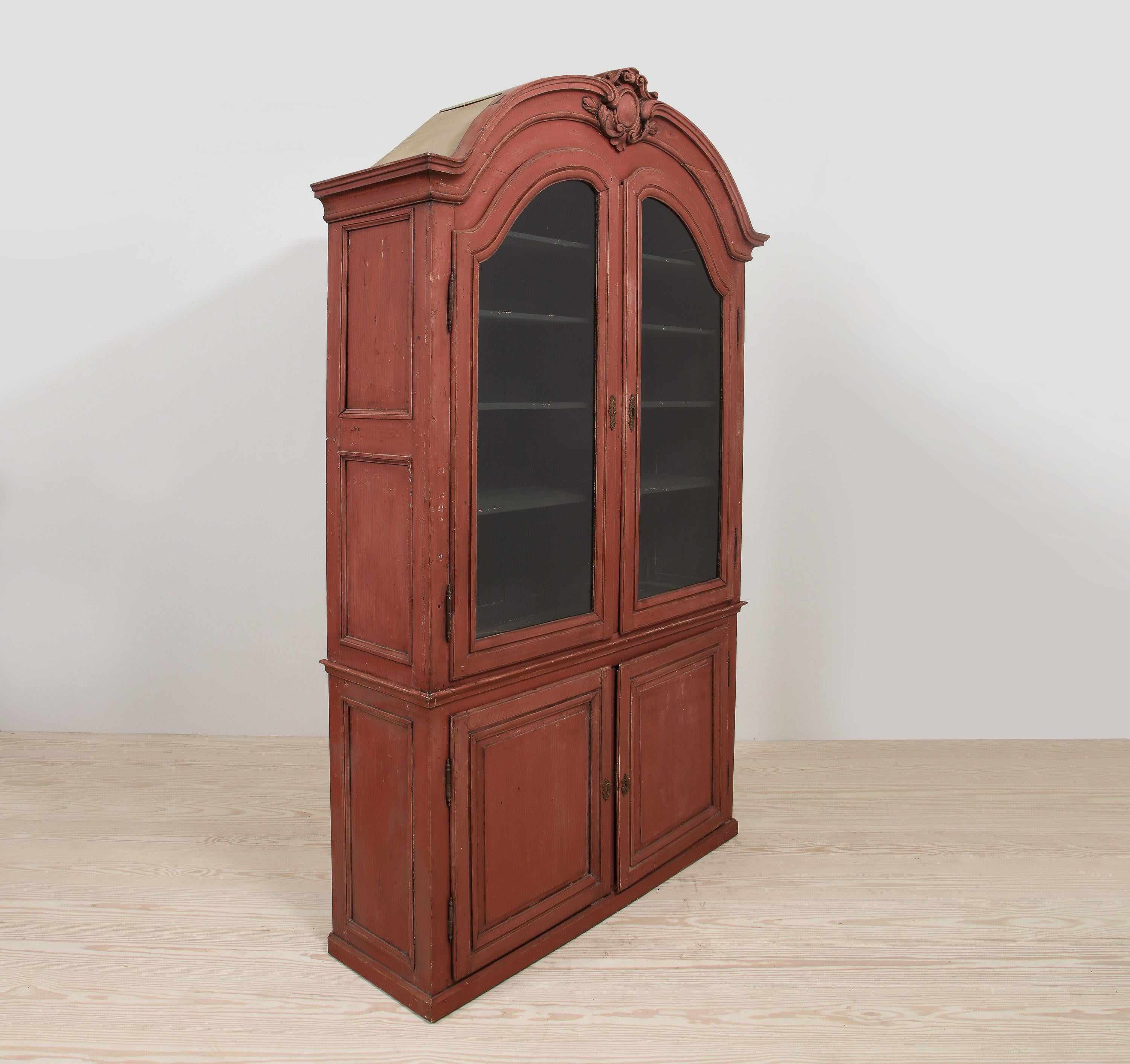 red cabinet with glass doors