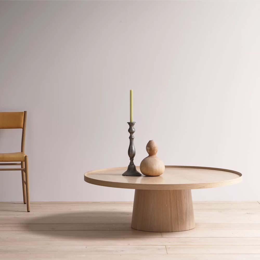 The Rodan coffee table : rigorous simplicity & comfort

Rodan is inspired by the restraint and detailing of the iconic Shaker box. The table marries a turned, solid wood and very stable base, upon which sits the top, whose lip is then secured with a