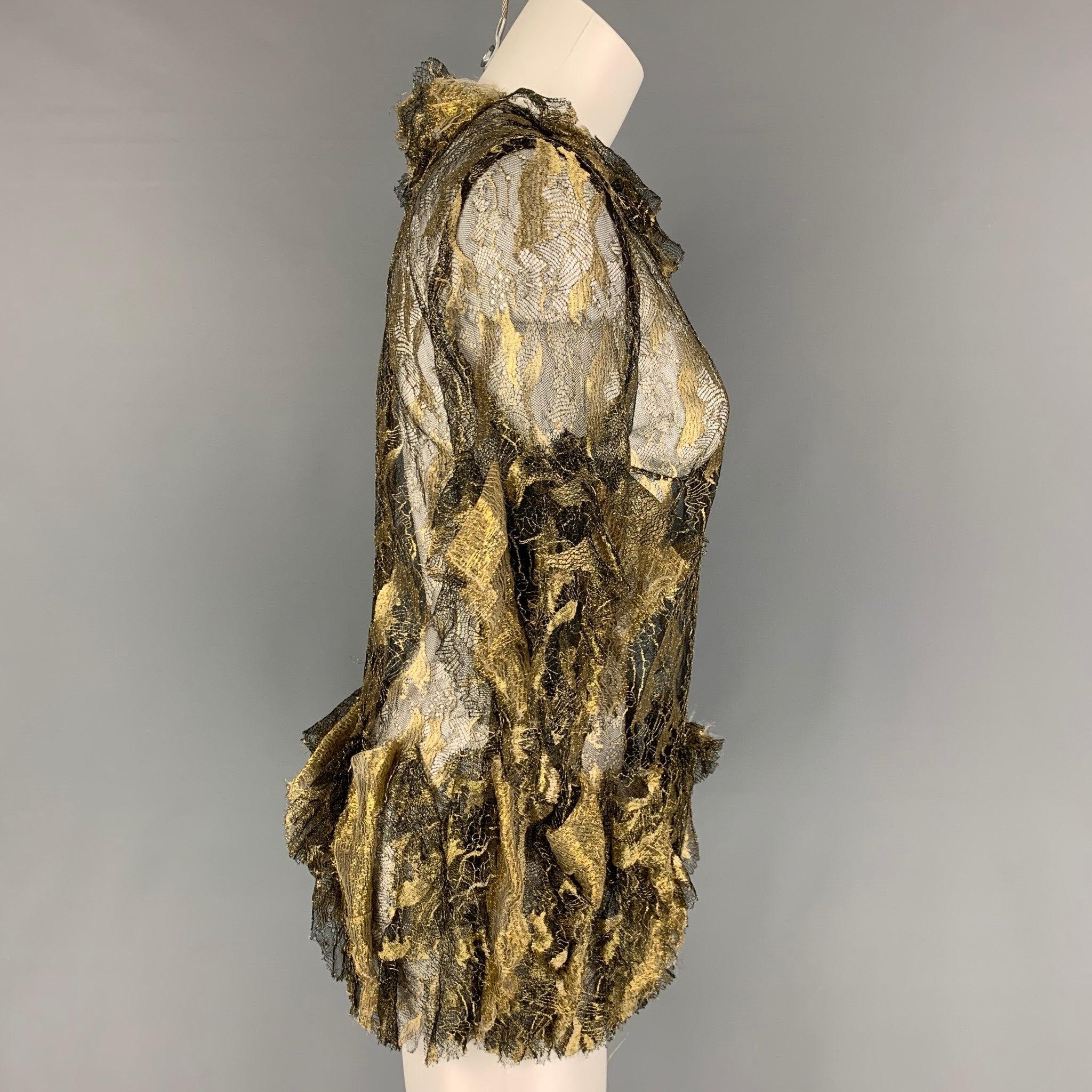 RODARTE dress top comes in a gold & black antique lame polyamide blend featuring a ruffled design, 3/4 sleeves, and a back zip up closure.
Very Good
Pre-Owned Condition. 

Marked:   8 

Measurements: 
 
Shoulder: 14 inches  Bust: 32 inches  Sleeve: