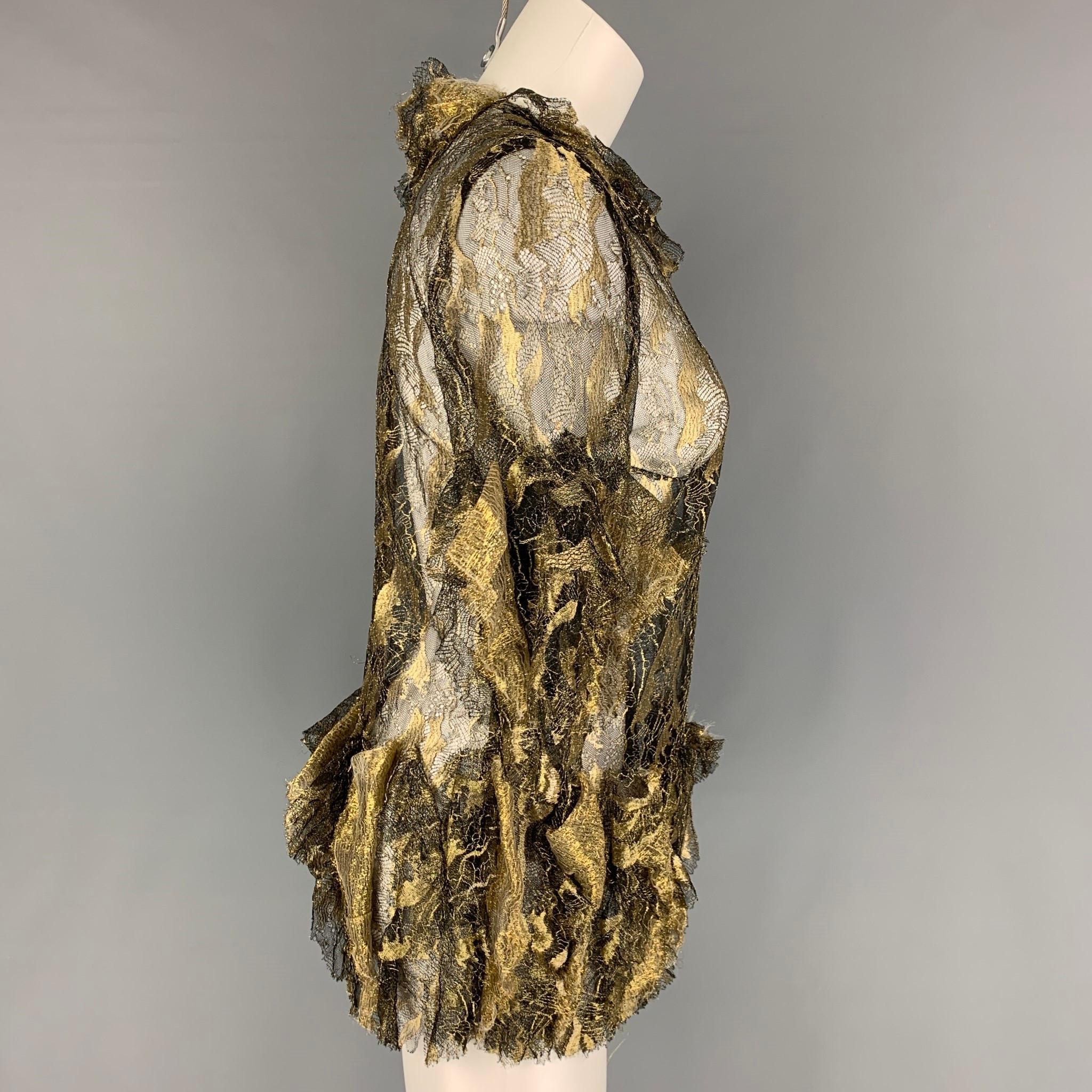 RODARTE dress top comes in a gold & black antique lame polyamide blend featuring a ruffled design, 3/4 sleeves, and a back zip up closure. 

Very Good Pre-Owned Condition.
Marked: 8

Measurements:

Shoulder: 14 in.
Bust: 32 in.
Sleeve: 16