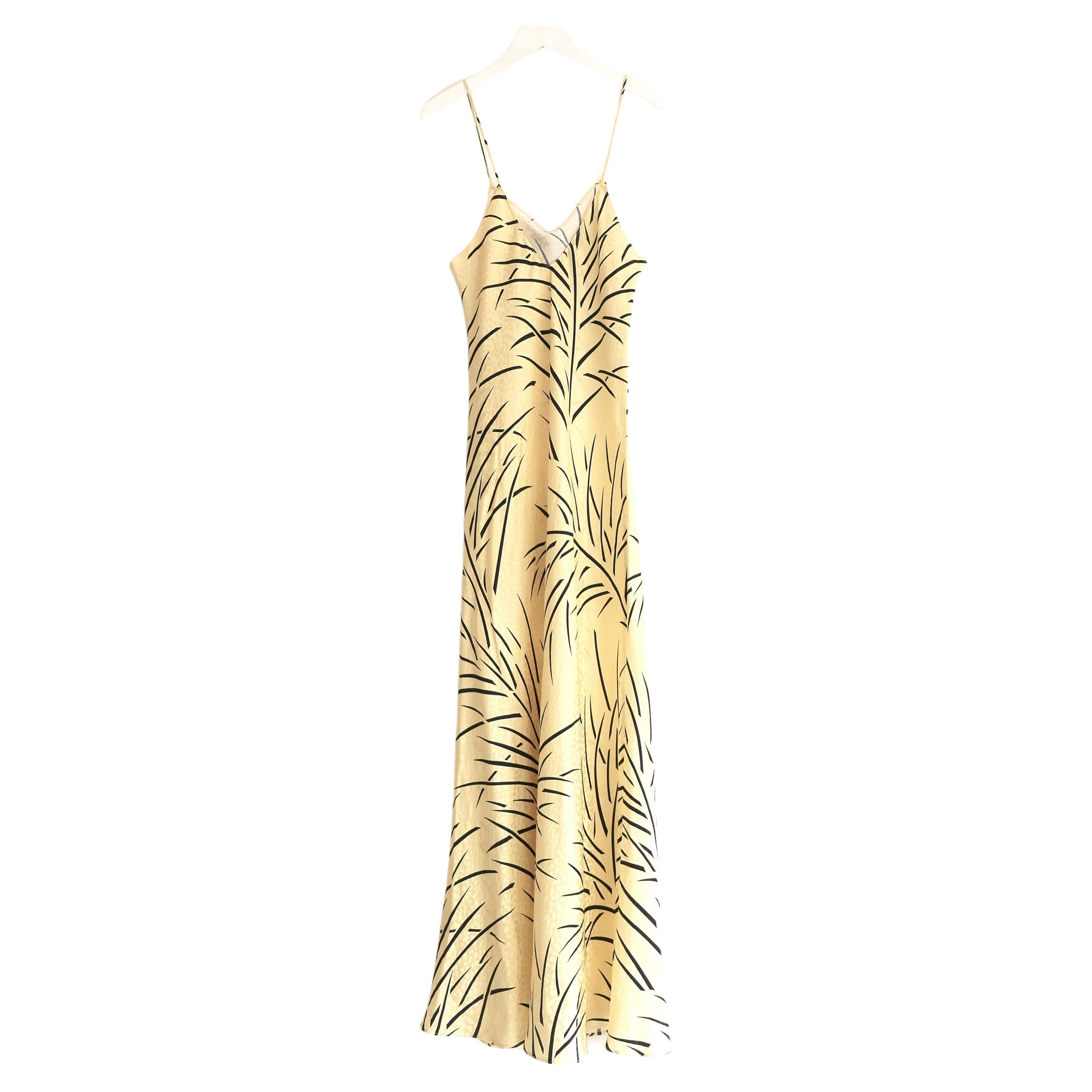 Schlankes, mit Korsagen verziertes Slip-Kleid von Rodarte. Gekauft für £825 und ungetragen. Es ist aus leuchtend gelber Seide mit Palmenmuster gefertigt und hat einen sehr schmeichelhaften Schrägschnitt, zarte Spaghettiträger und eine abnehmbare,