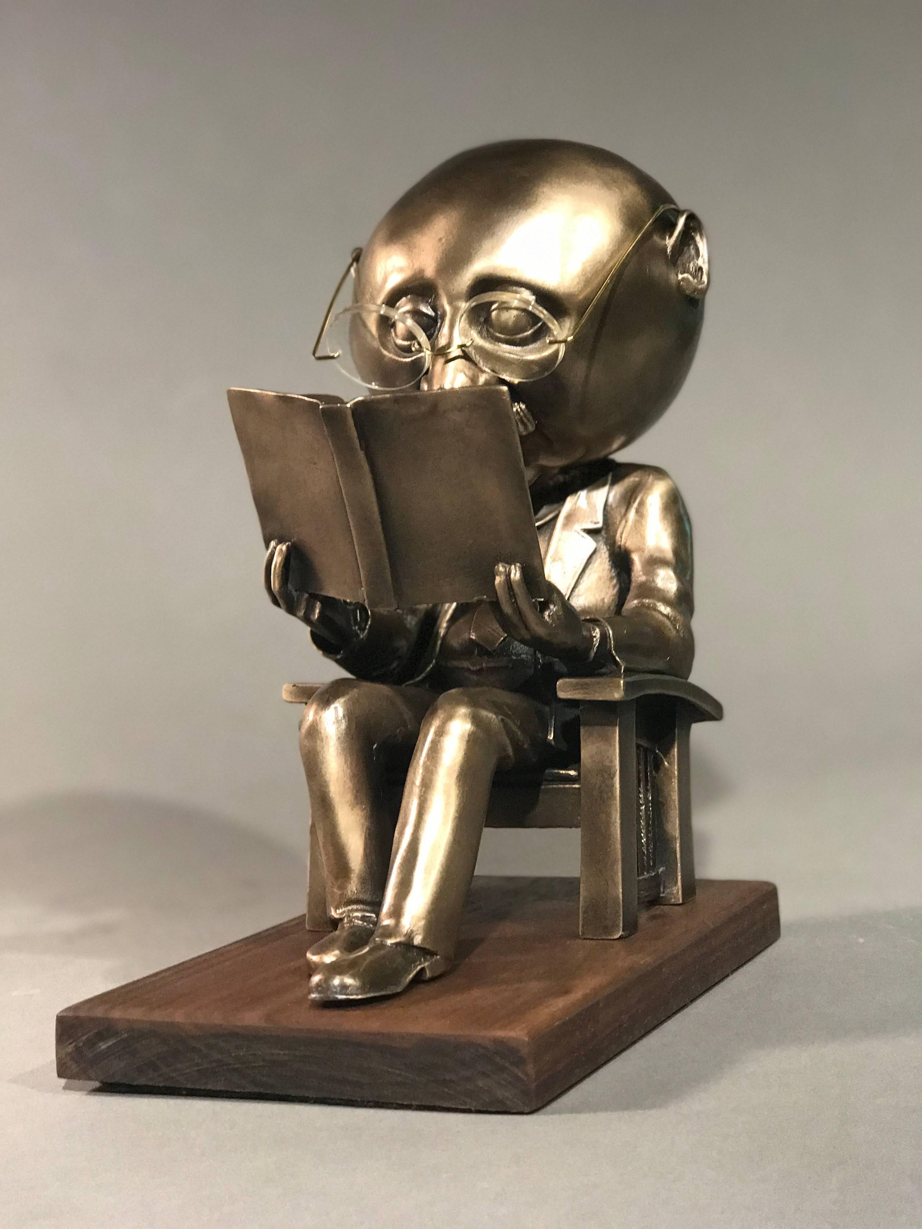 The Reader (small), Rodger Jacobsen gold bronze sculpture, reading book, glasses  1