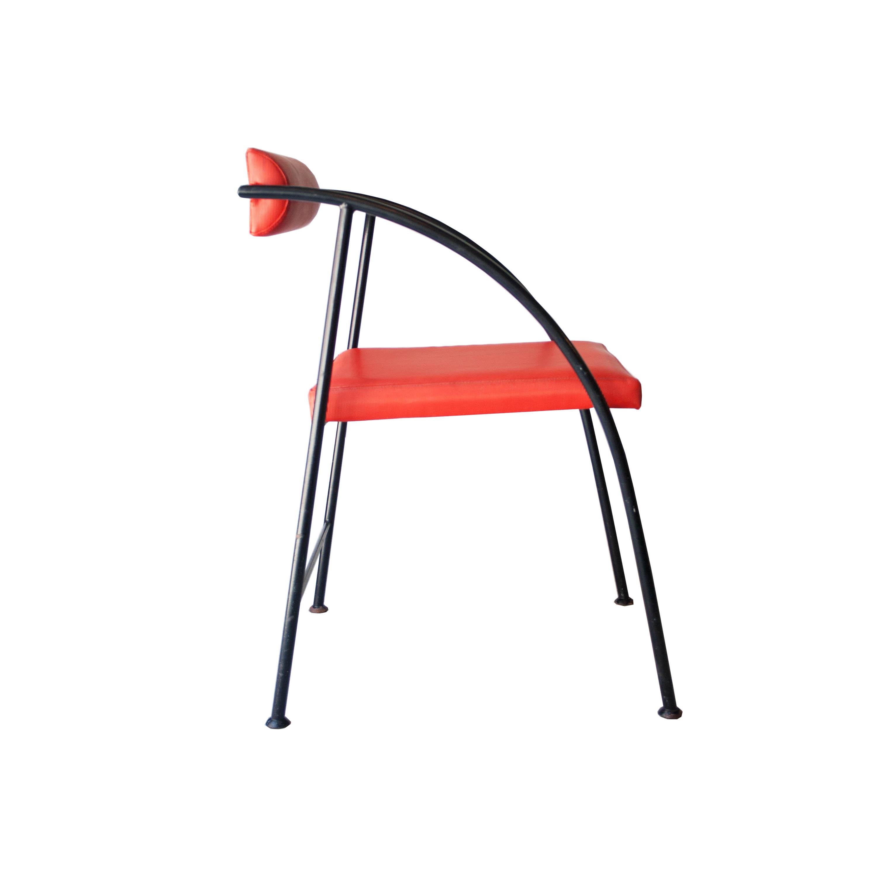 Chair designed by Rodney Kinsman with black lacquered metallic structure and red vinyl upholstery.