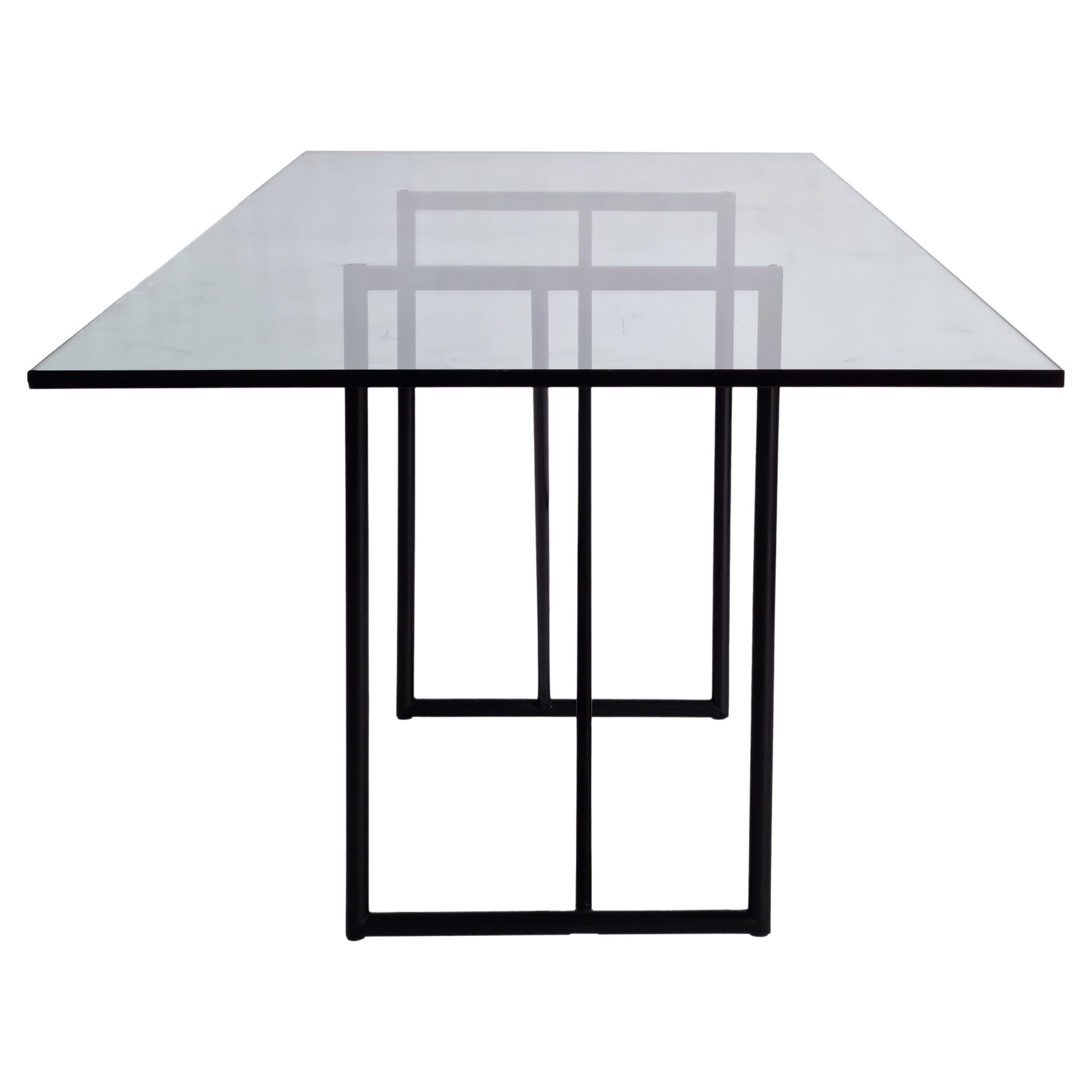 This complete dining set, designed by British industrial designer Rodney Kinsman for the renowned Italian manufacturer Bieffeplast, embodies the essence of 1980s postmodern minimalism.

The set consists of a dining table and four Tokyo dining