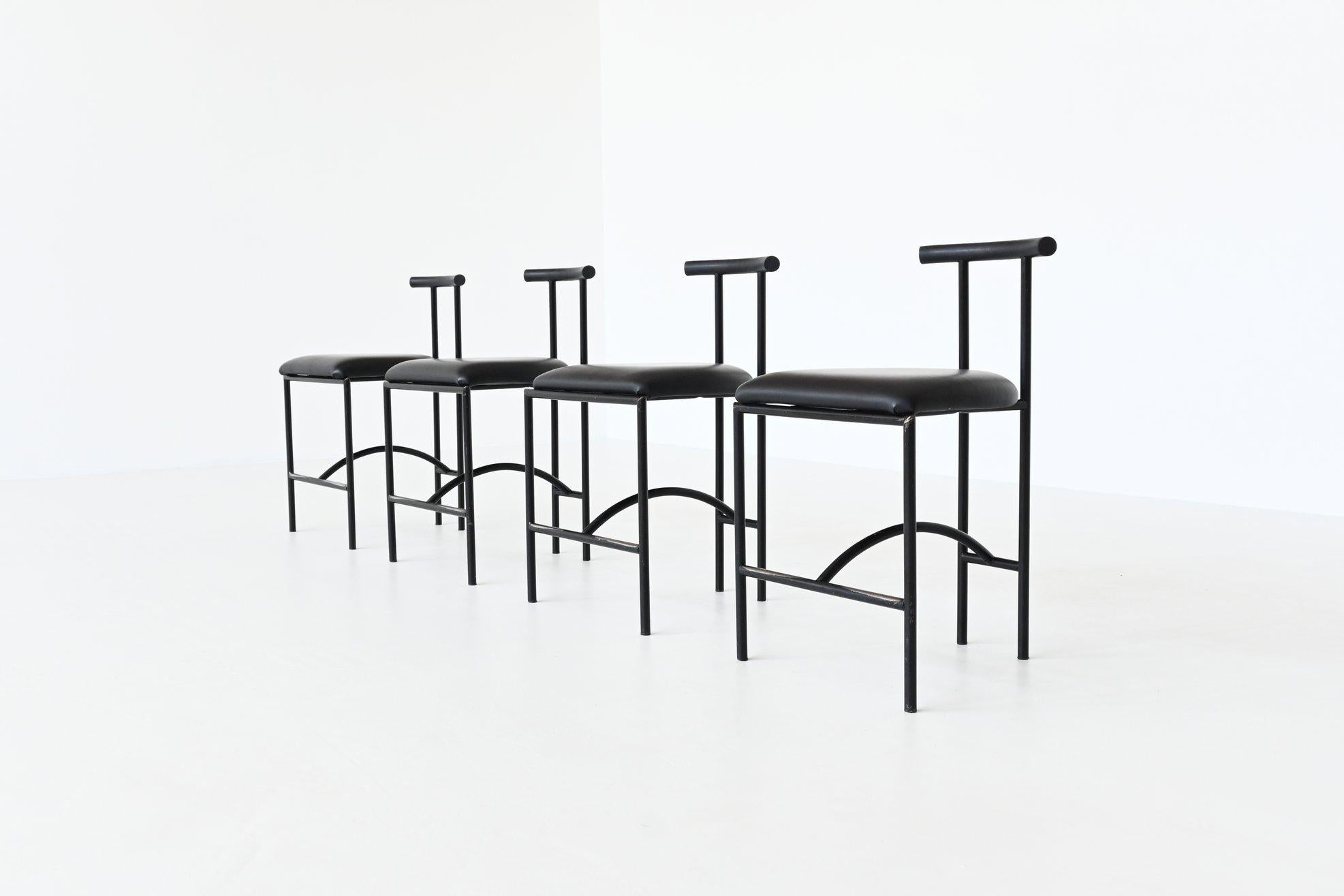 Beautiful set of four Tokyo dining chairs designed by Rodney Kinsman for Bieffeplast, Italy 1985. They have Japanese inspired forms. The chairs have a black painted tubular metal frame, a black rubber back rest and black faux leather upholstered