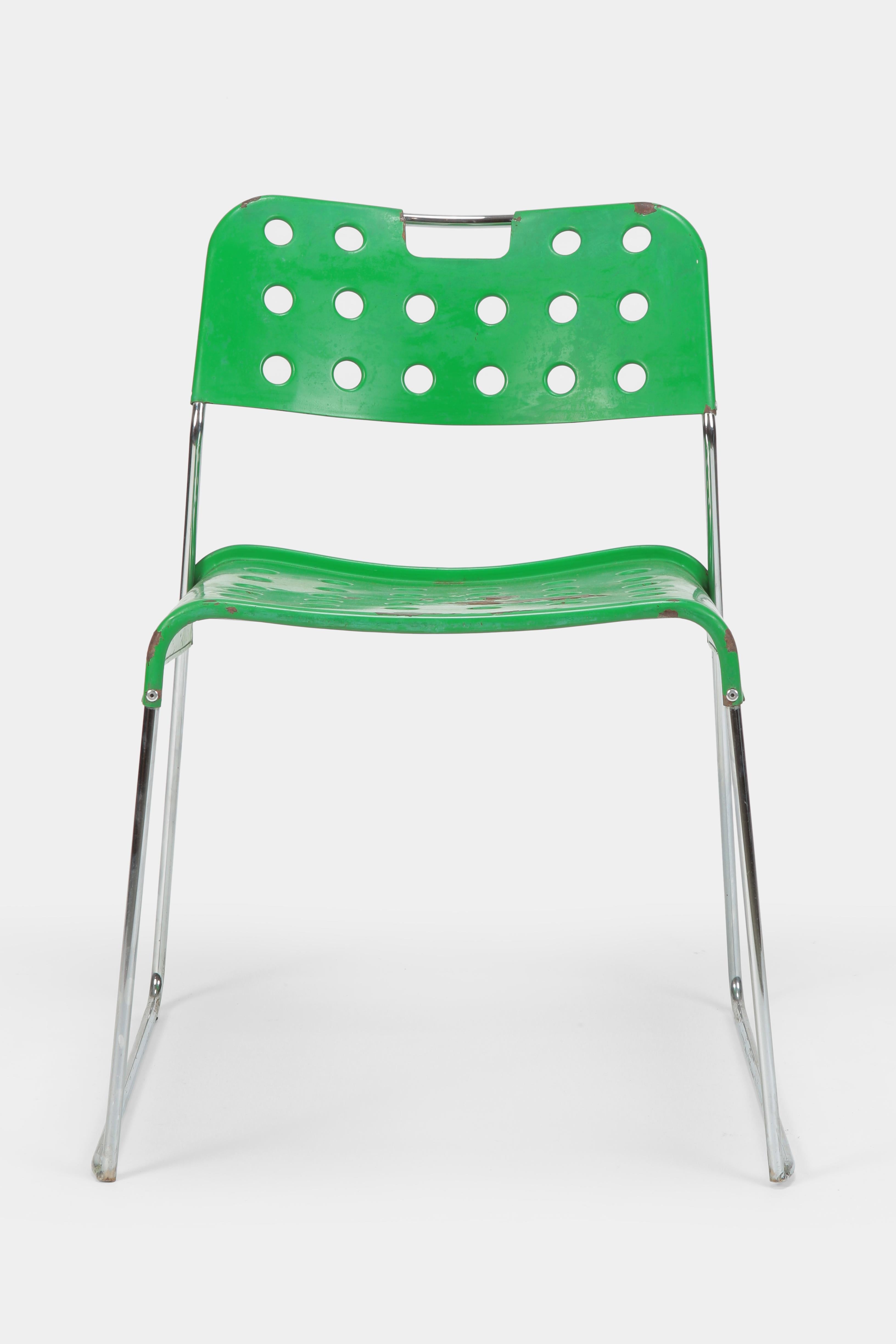 Rodney Kinsman “Omstak” chair manufactured by Bieffeplast in the 1970s in Italy. Seat and back rest made of green lacquered, perforated metal attached to a chrome steel frame. Popular collectible with intense patina.
