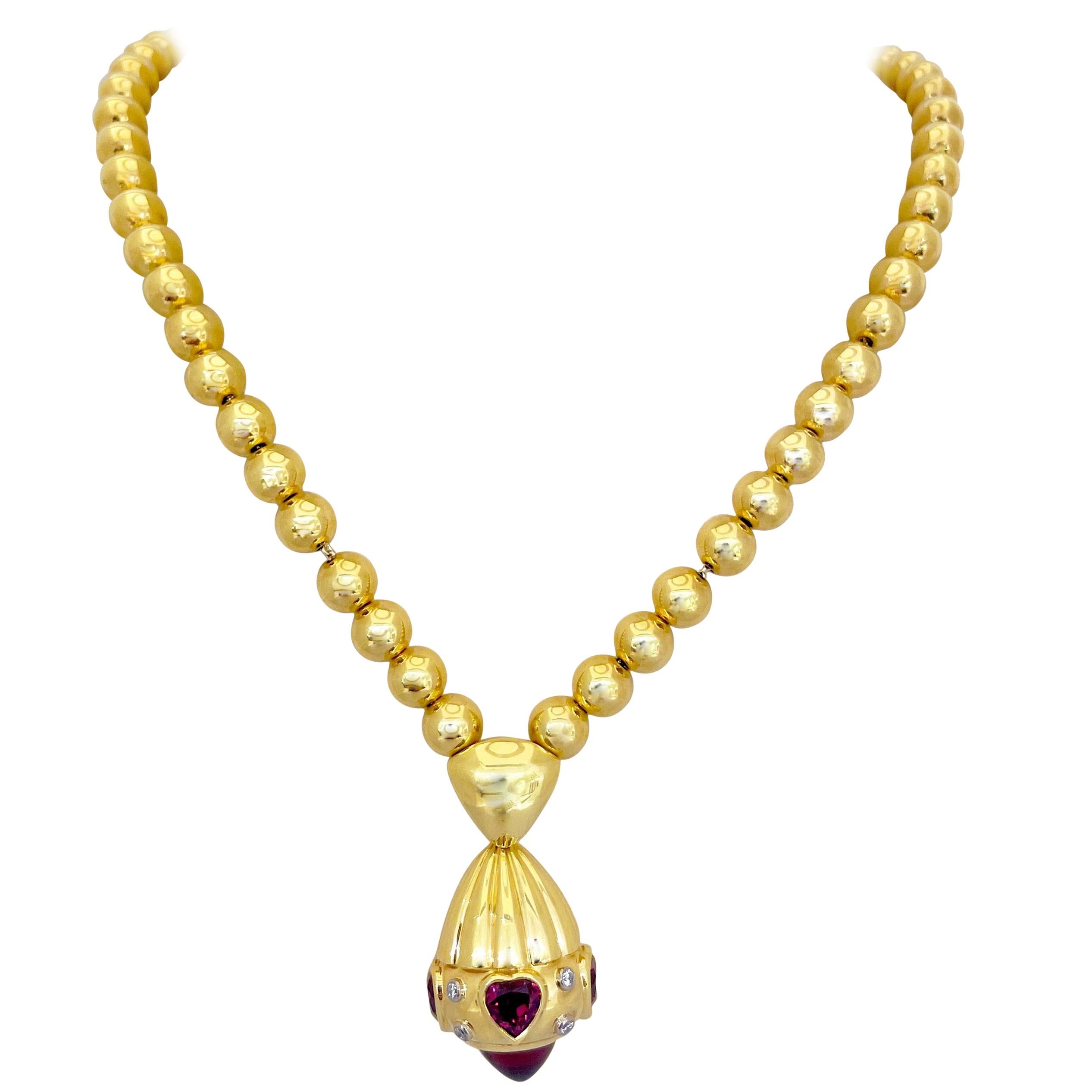 Rodney Rayner Perlenkette aus 18 Karat Gold mit Rhodolithherzen und Diamanten im Angebot