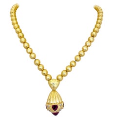 Vintage Rodney Rayner 18 Karat Gold Bead Necklace with Rhodolite Hearts and Diamonds