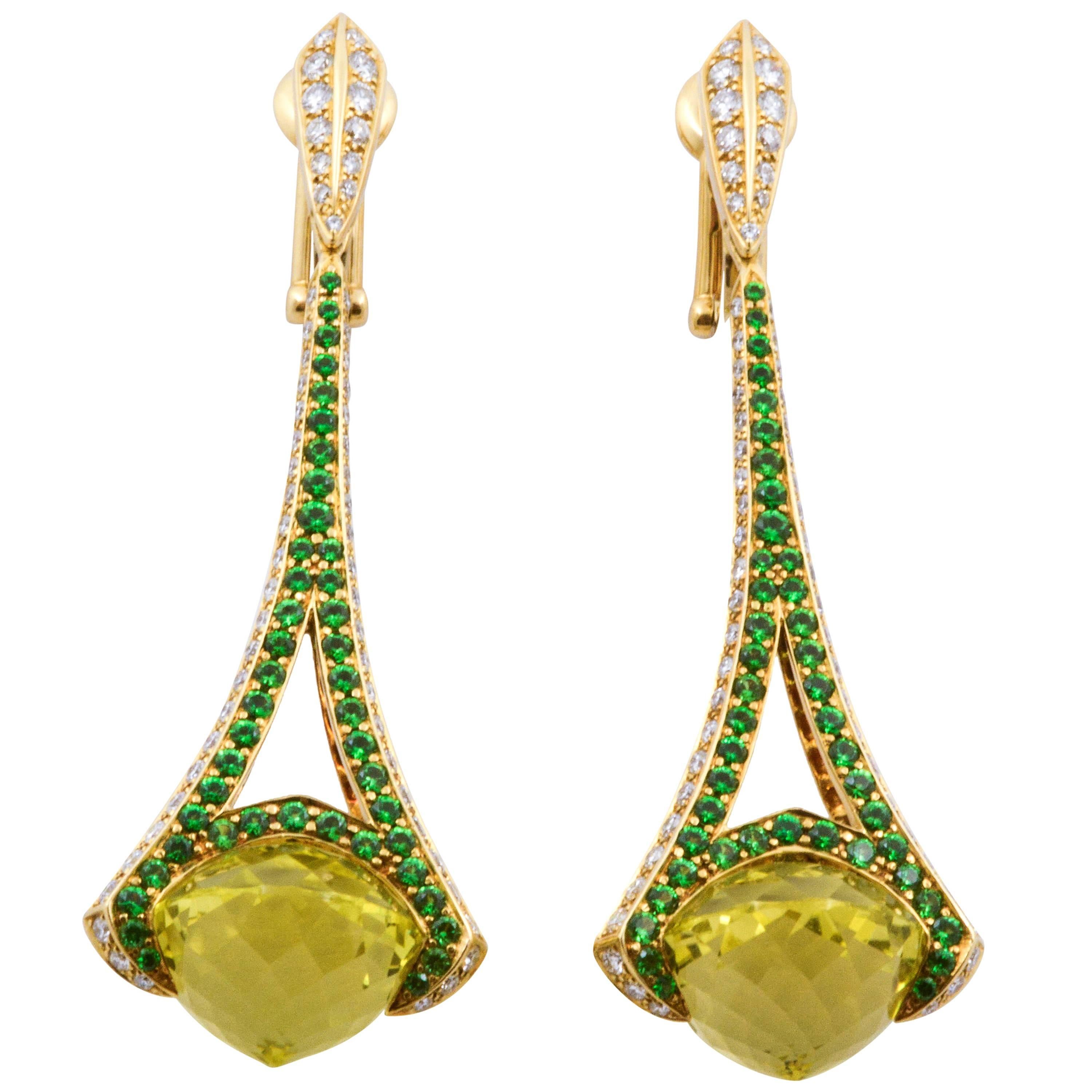 She’ll adore these enchanting gemstone and diamond drop earrings from Rodney Rayner. Created in 18K yellow gold with stunning 28.24ctw lime quartz, framed with 1.75ctw Tsavorite garnets, and 1.58ctw diamonds (G-H color and VS clarity). These