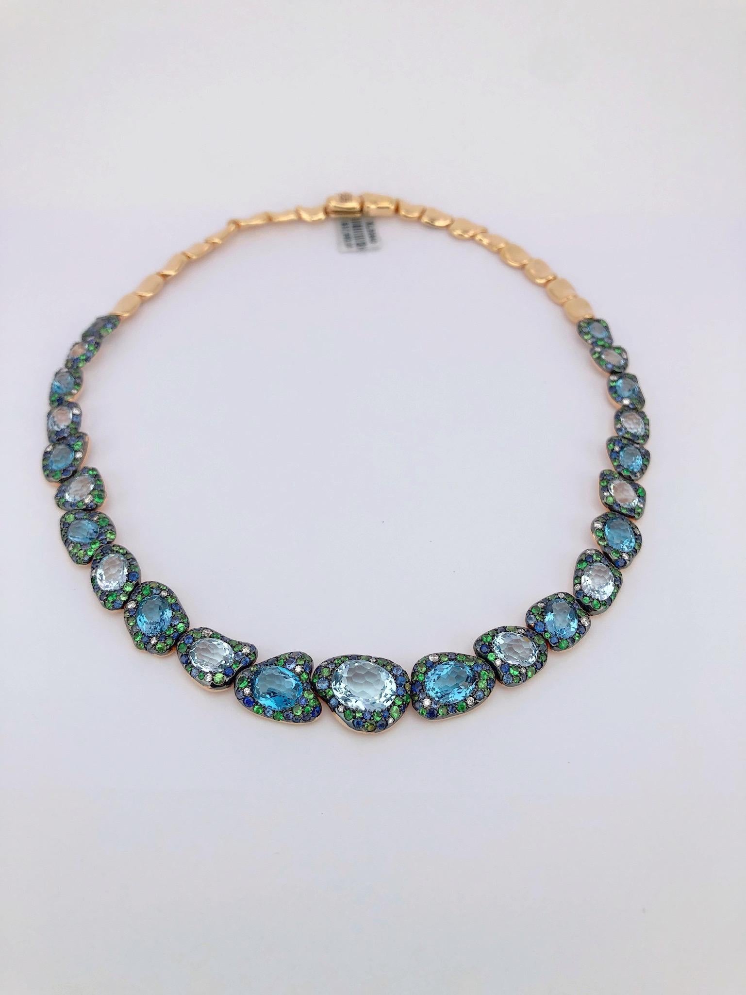 Modern Rodney Rayner 18kt RG, Blue Sapphire, Blue Topaz, Tsavorite and Diamond Necklace