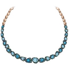 Collana Rodney Rayner 18kt RG, zaffiro blu, topazio blu, tsavorite e diamanti