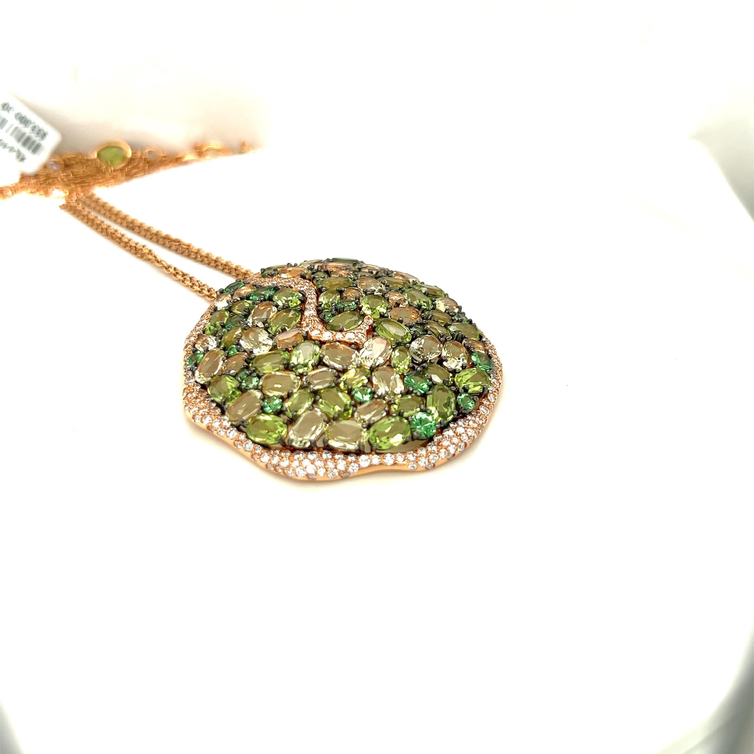 Rodney Rayner is known for his unique styling and use of beautiful color combinations. This 18 karat rose gold pendant necklace is a perfect example of his work. Various shades of oval peridot and lime green quartz stones are set in the organic