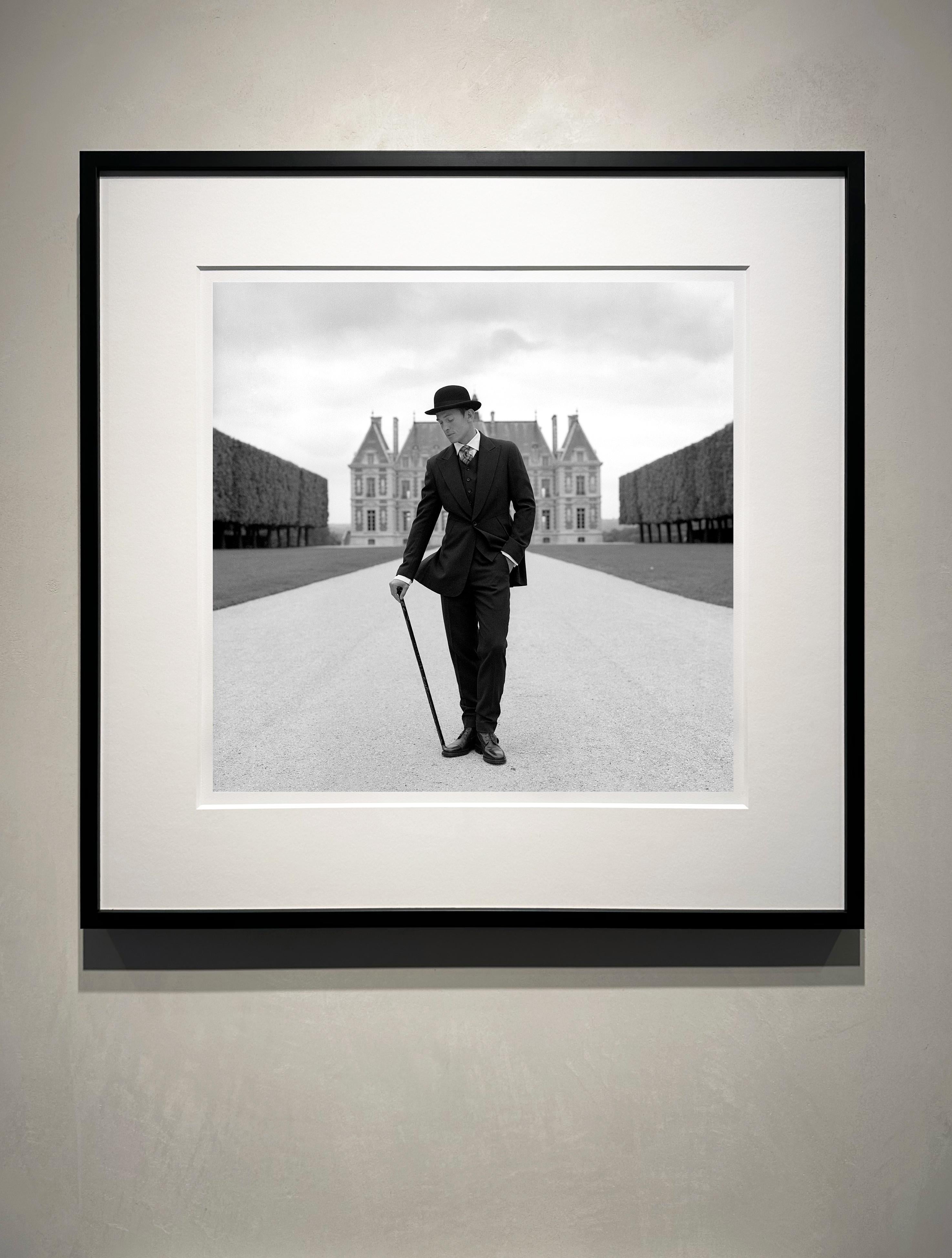Gary with Cane, Parc de Sceaux, France - 30 x 30 inches, FRAMED - Photograph by Rodney Smith