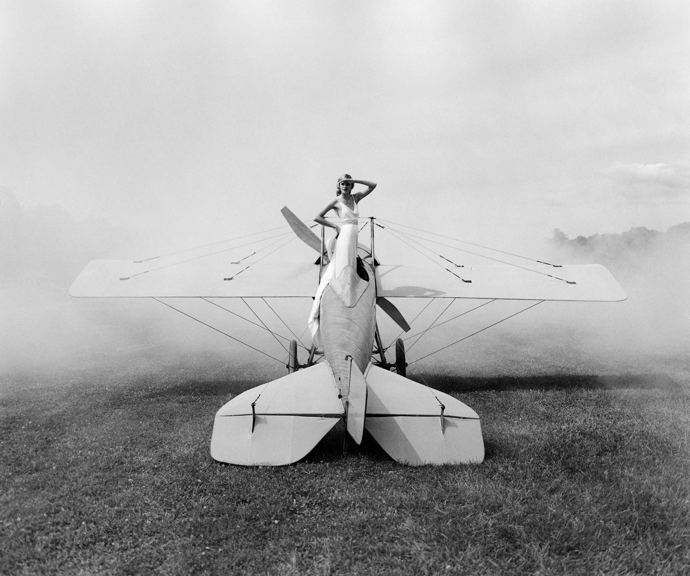 Rodney Smith Figurative Photograph - Ingrid on Plane, Rhinebeck, NY - 20 x 24.5 inches