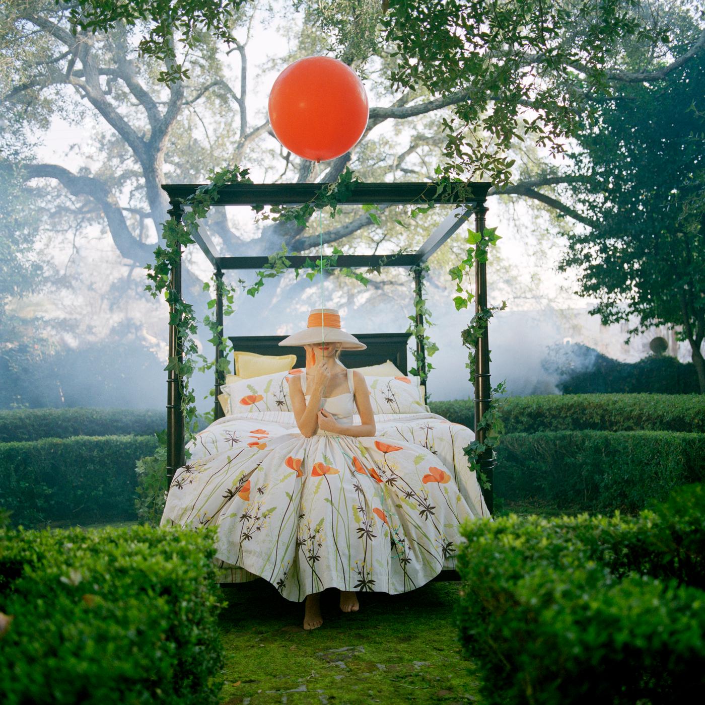 Rodney Smith Color Photograph - Maria Holding Orange Balloon, Charleston, SC - 40 x 40 inches