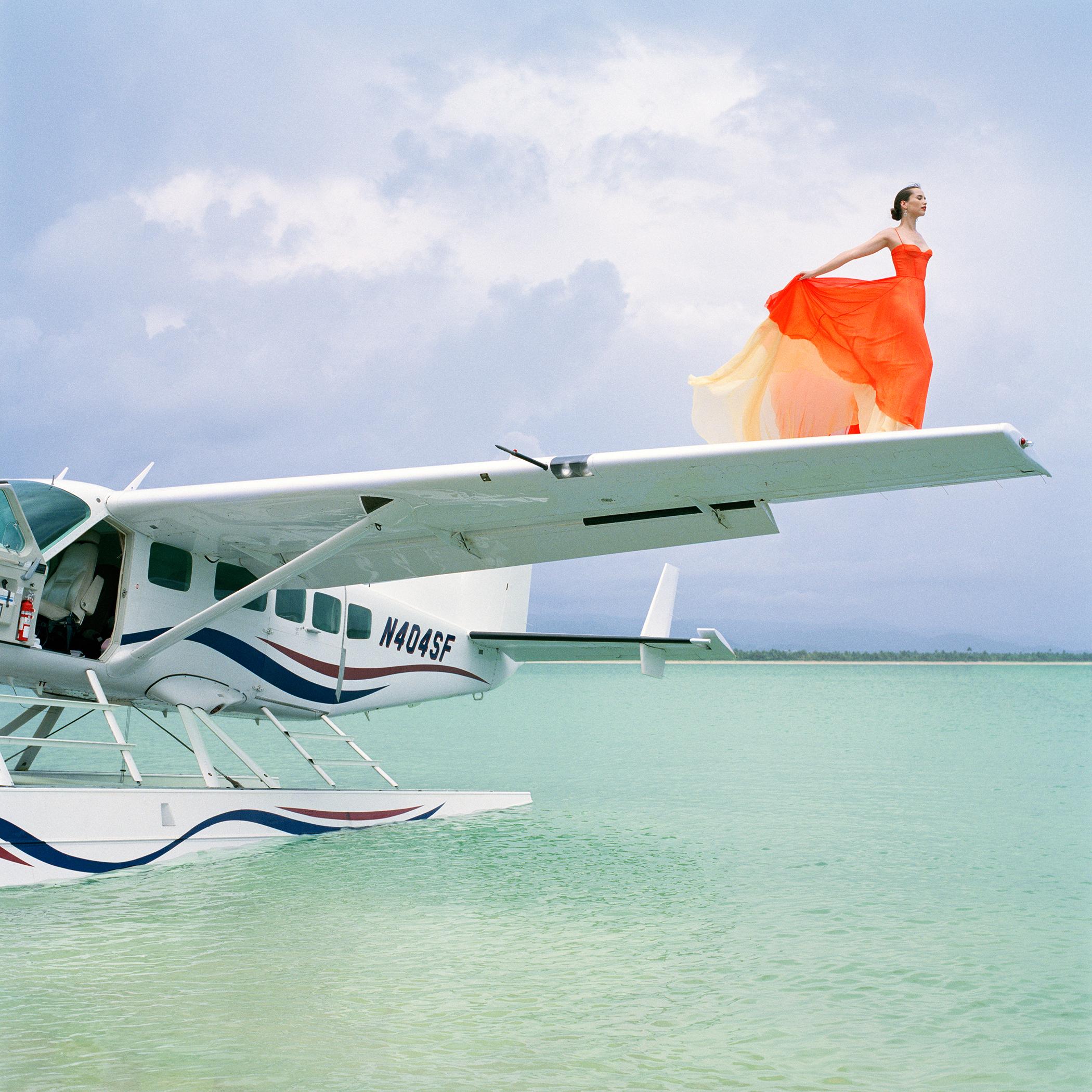Color Photograph Rodney Smith - Saori on Sea Plane Wing II, République dominicaine