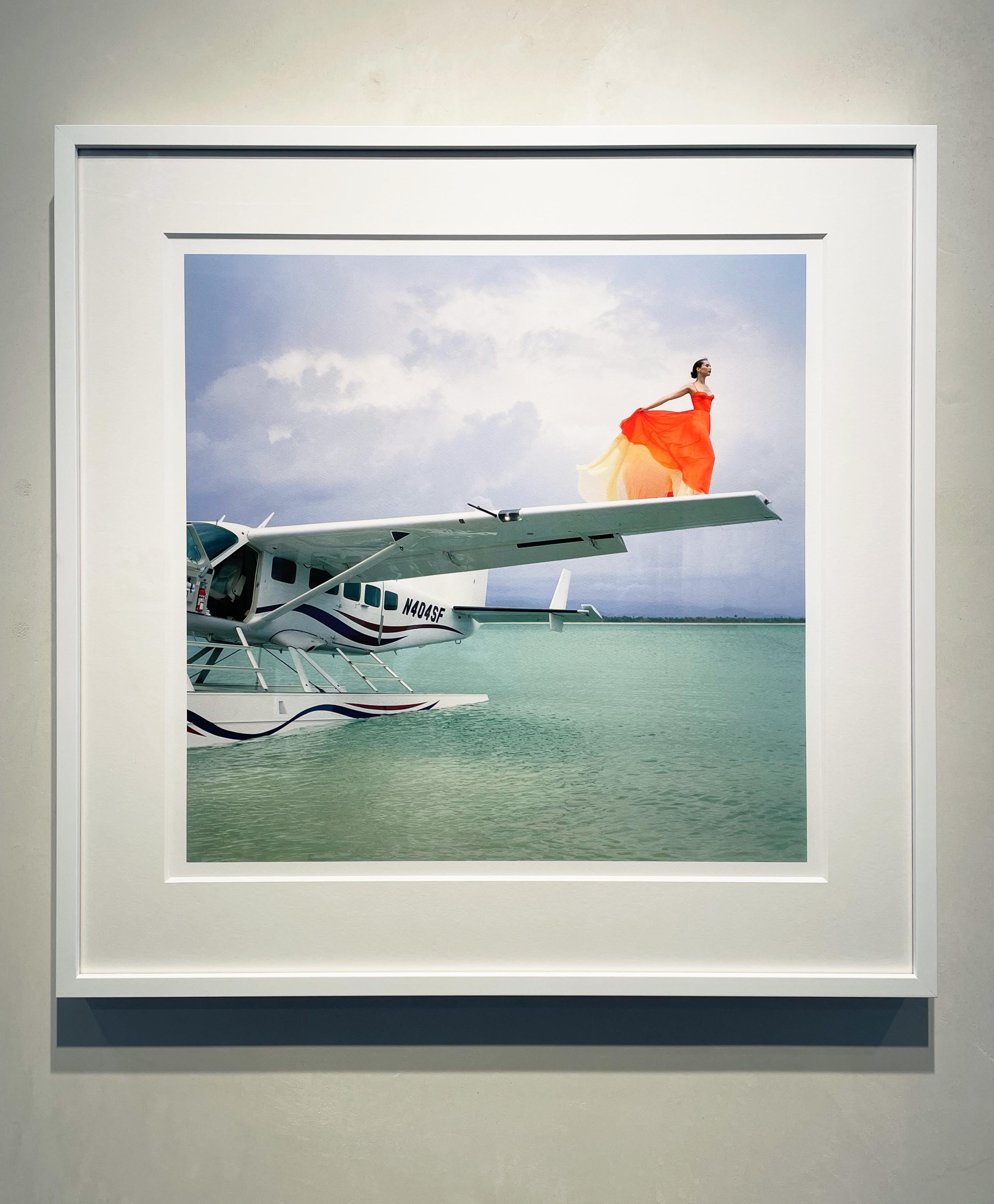 Saori on Sea Plane Wing No. 2, Dominican Republic - 28 x 28 inches framed - Contemporary Photograph by Rodney Smith