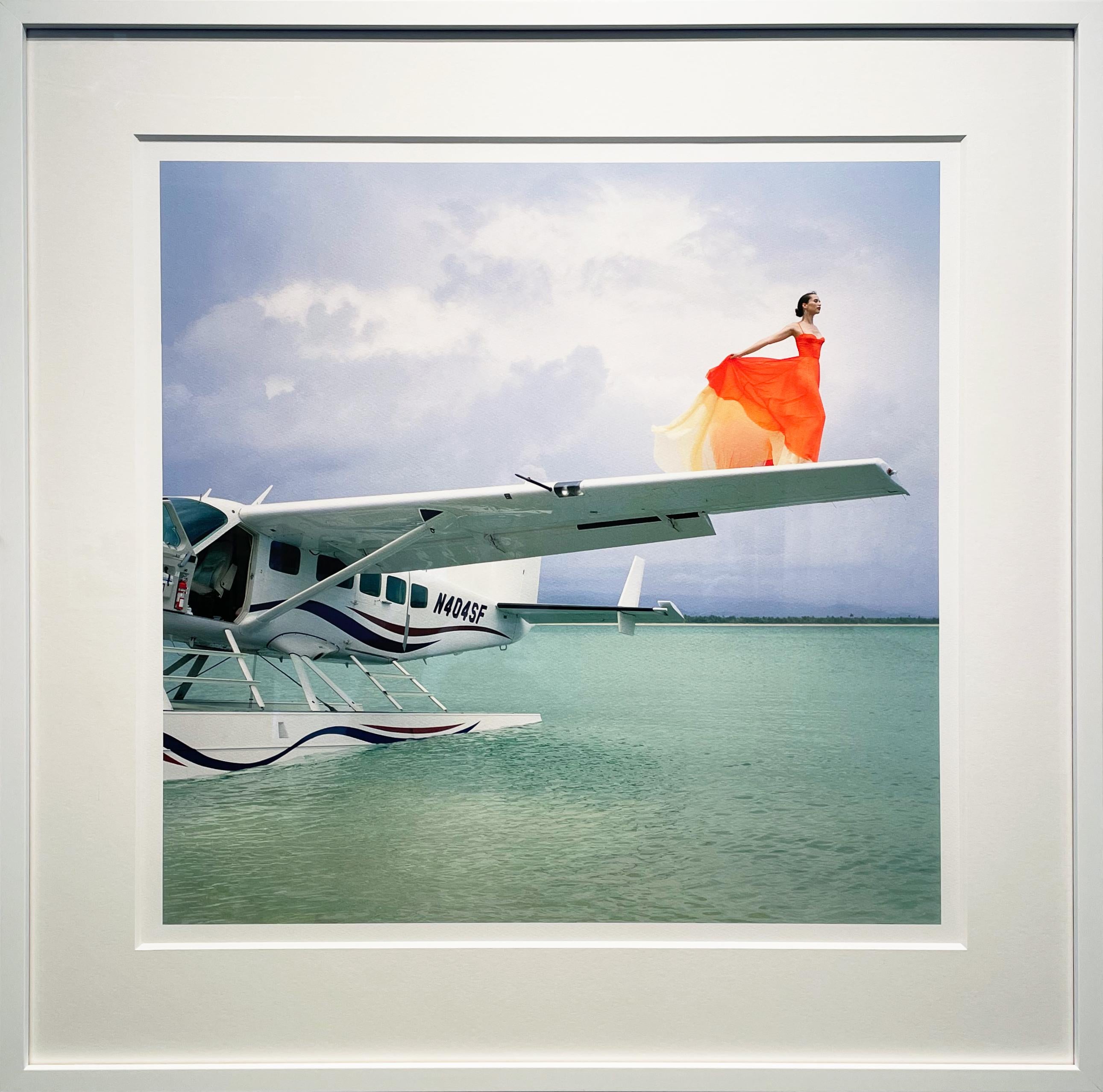 Saori on Sea Plane Wing No. 2, Dominican Republic - 28 x 28 inches framed - Photograph by Rodney Smith