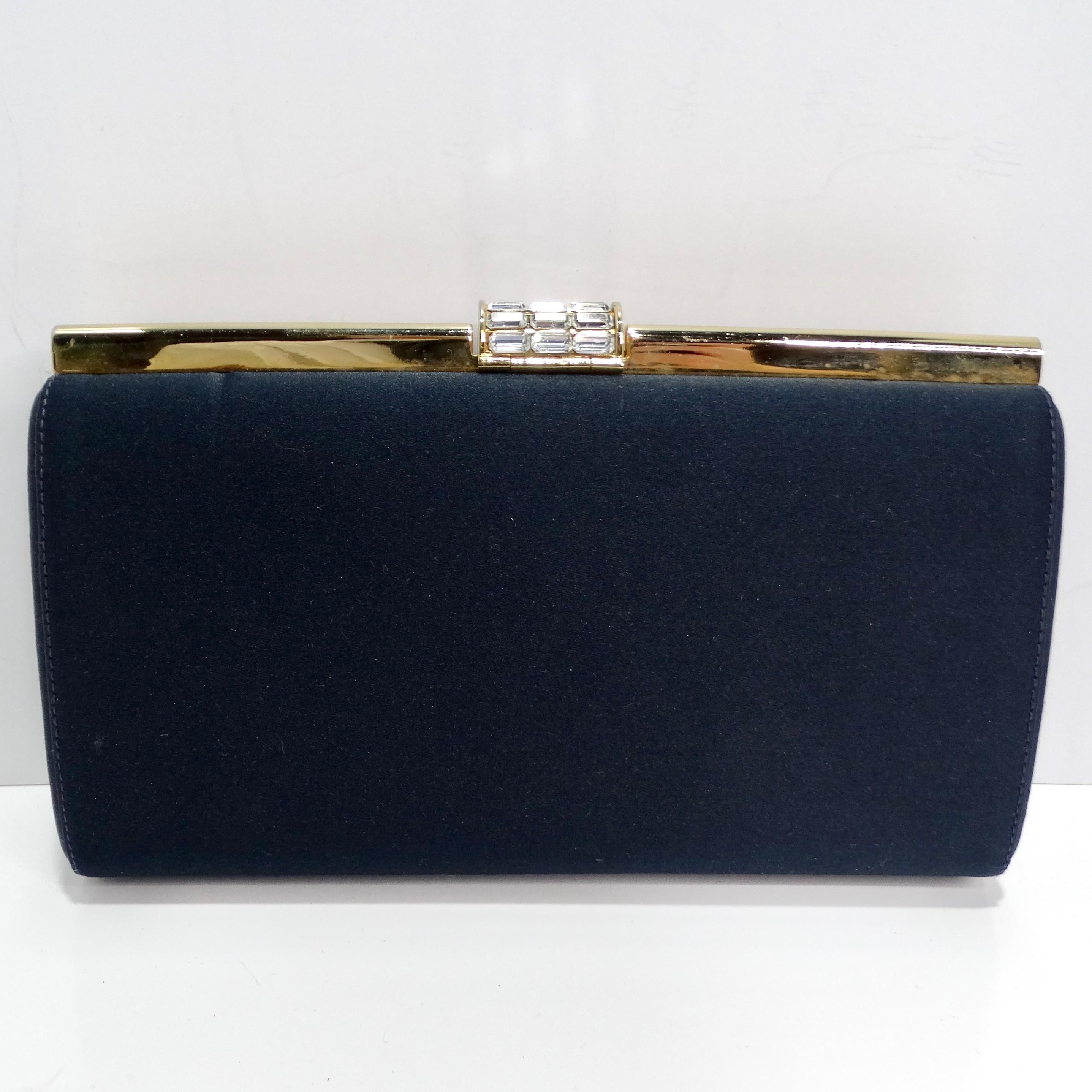 Introducing the elegant Rodo 1980s Navy Clutch, a timeless accessory that effortlessly combines sophistication and versatility. Crafted from luxurious navy blue leather, this classic rectangular clutch exudes understated glamour.

The clutch is