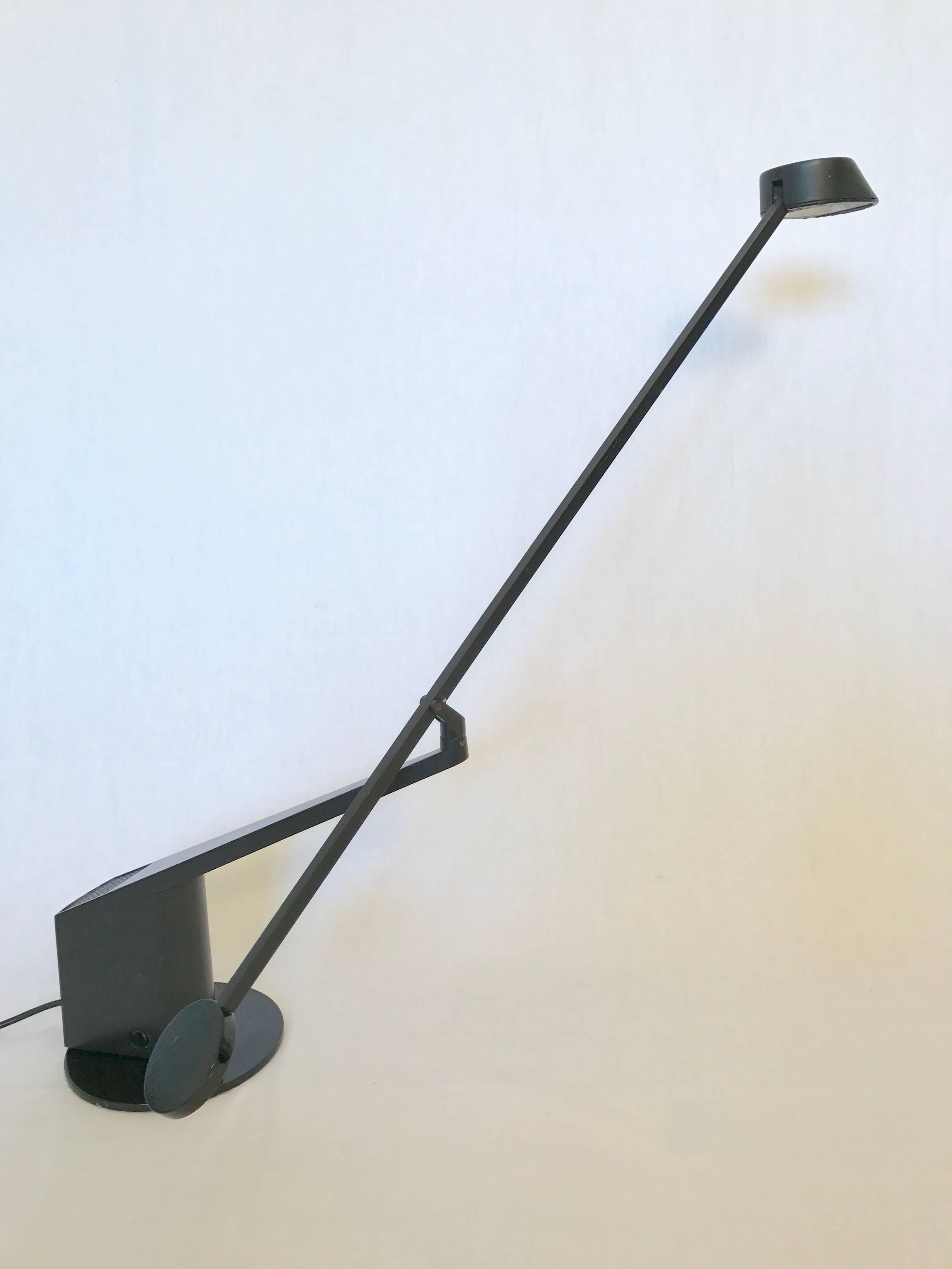 An adjustable black lacquered, aluminum allow table or desk lamp by Rodolfo Bonetto for iGuzzini, Italy, 1980s.