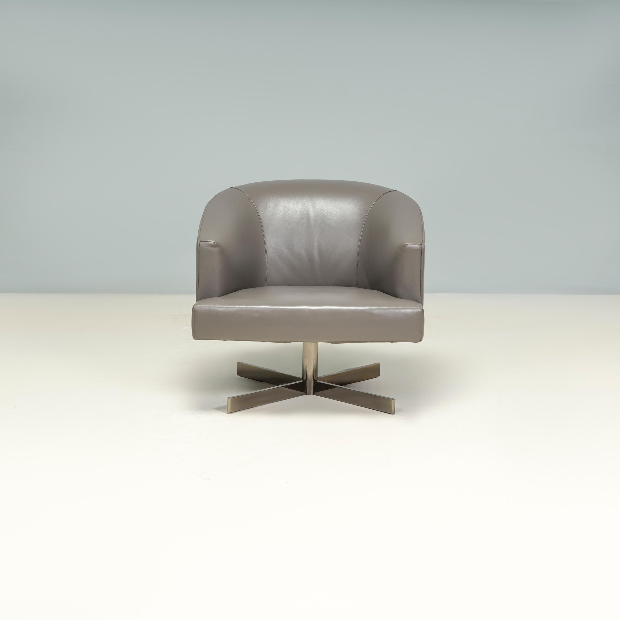Designed by Rodolfo Dordoni for Minotti, the Martin armchair is a fantastic example of elegant contemporary Italian design.

Featuring a square seat cushion and softly curved backrest, the chair is fully upholstered in a grey leather.

The seat sits