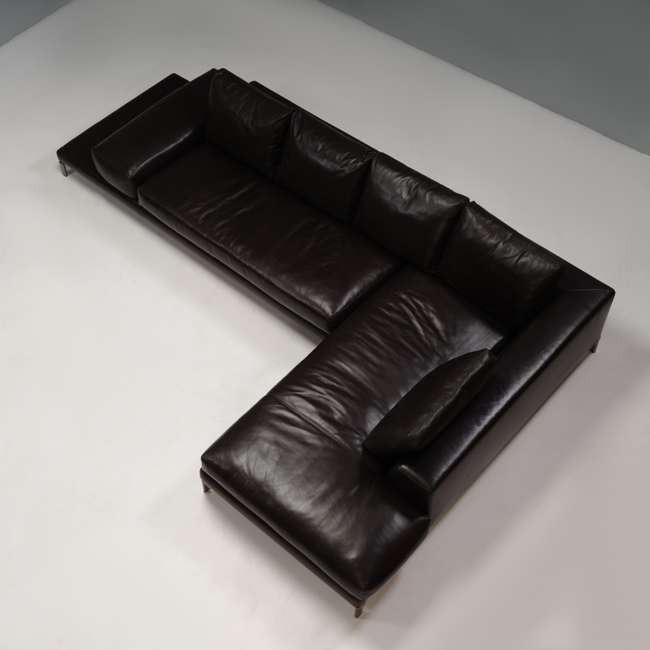 Designed by Rodolfo Dordoni for Minotti, this Hamilton Island corner sofa combines minimalism and elegance.

Constructed with a metal frame and sleek black-nickel finish feet, the sofa features an inclined back and is fully upholstered in black