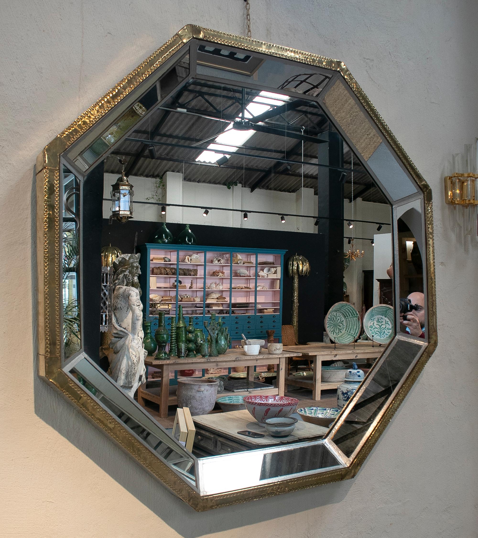 Rodolfo Dubarry, Spin 1989s, two-tone bronze panelled octagonal mirror.