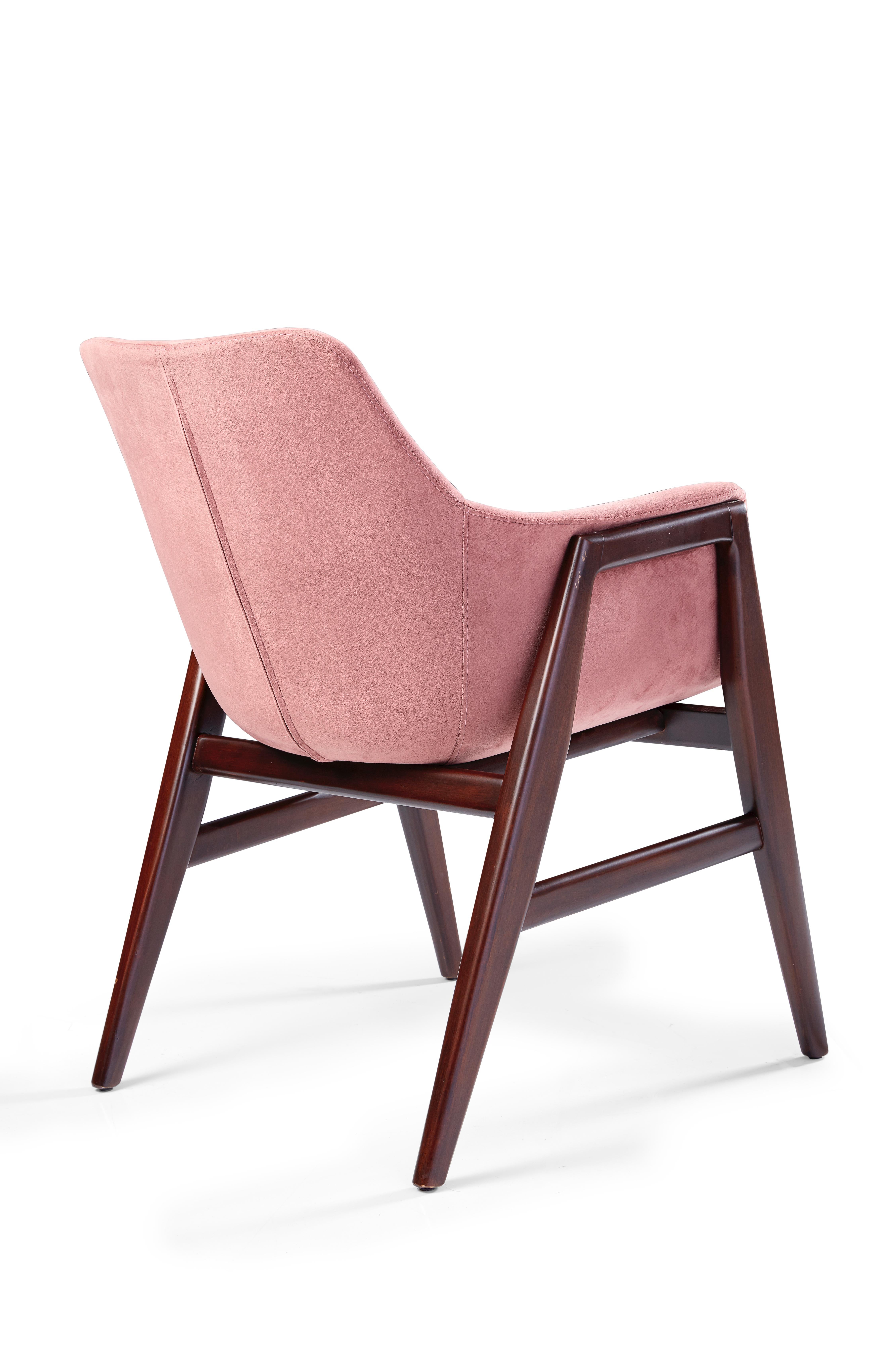 With sleek, angular lines and a beautiful hand-finish, the Rodos chair is the epitome of chic city style. Designed like a slim lounge chair, the fully upholstered seat and back bring comfort with a modern sensibility.