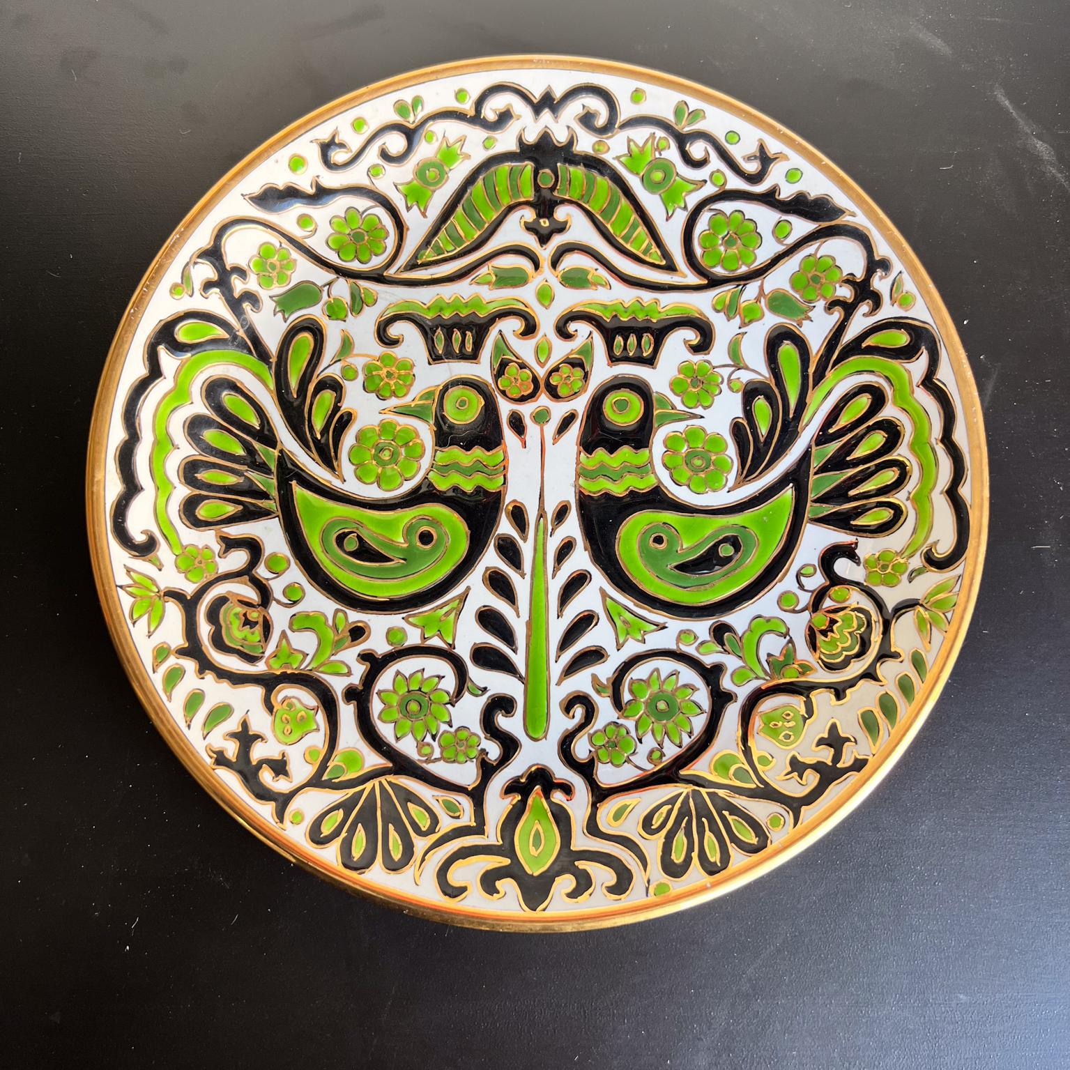Greek Rodos Keramik decorative handmade plate
Perforation on the back. A string can be added for art wall decor
Preowned good vintage condition
9.63 diameter x .88
Refer to images