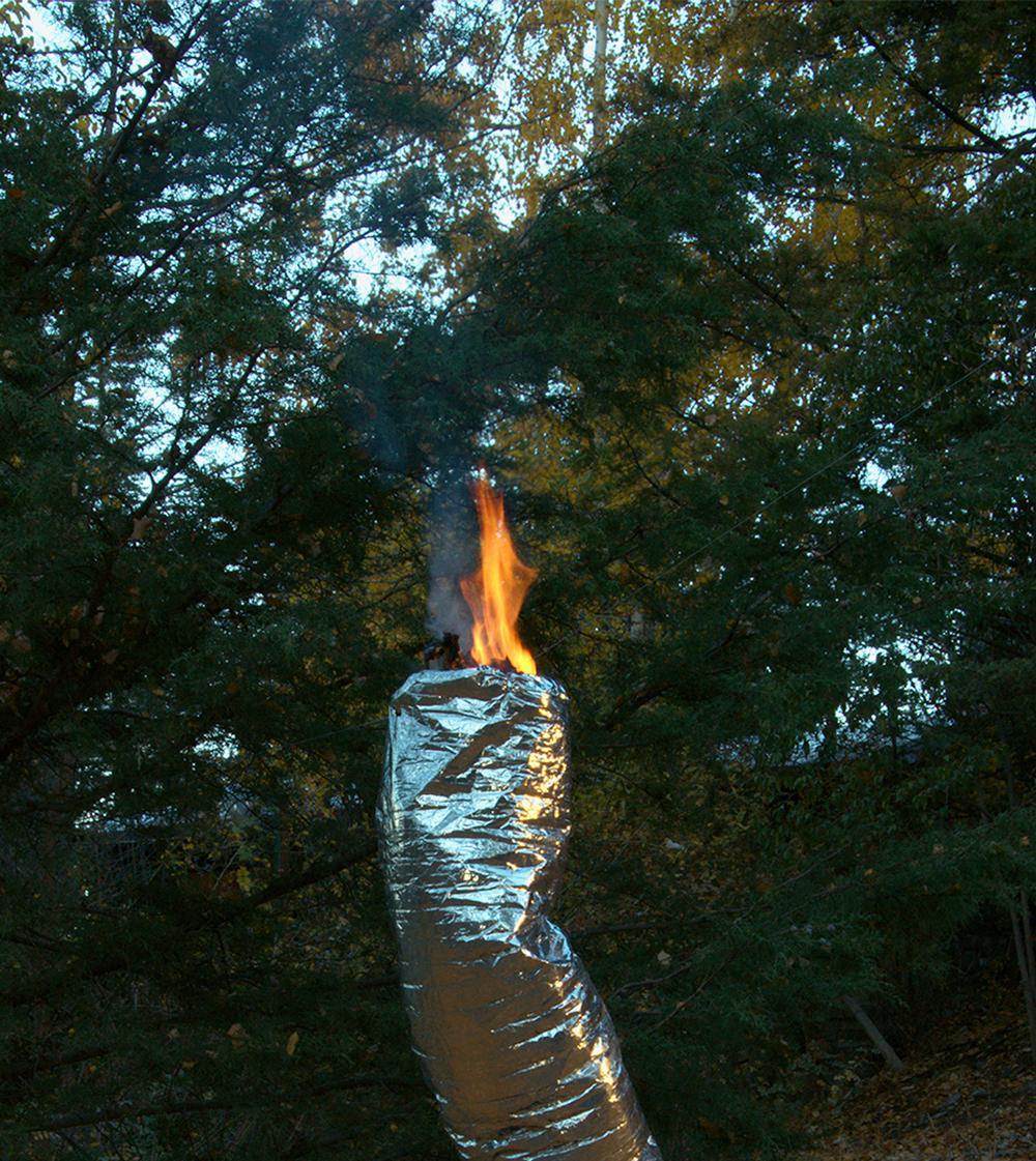 Untitled Chimney, 2010 by Rodrigo Etem
From the series Ser Cosa
Archival pigment print on fine art paper
Size: 40 H x 26 W inches. 
Edition of 7
Unframed

…this series of portraits that at first glance appear to us as extraterrestrial beings, once