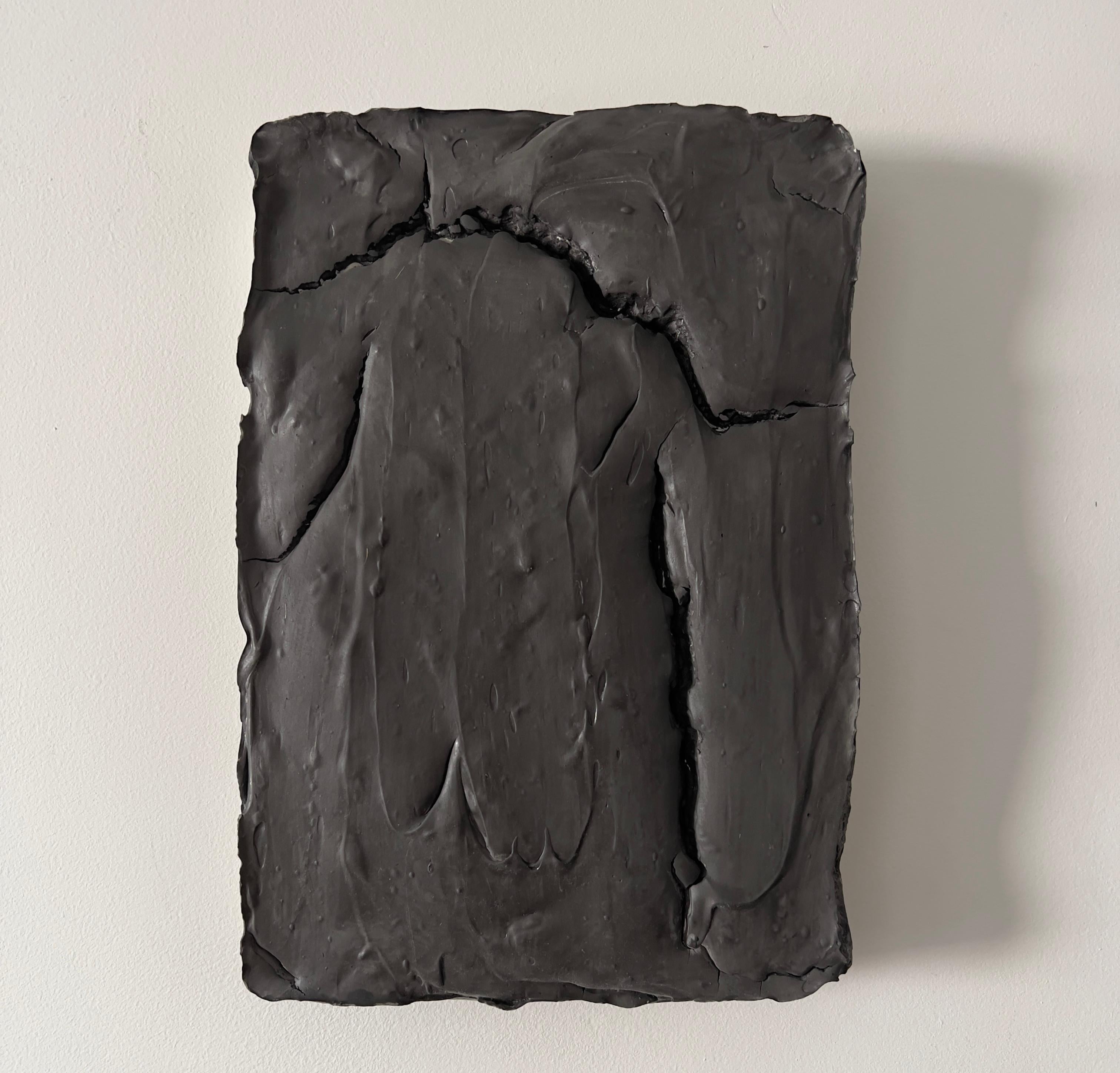 Ragisména series Black, 2021  by Rodrigo Zampol
From Ragisména Series
Plaster and ink on canvas
Dimensions: 30 cm H x 20 cm W
Weight: 3 kg
Unique piece

Signed on the back
The piece has a certificate of authenticity

Ragisména Series
The Ragisména