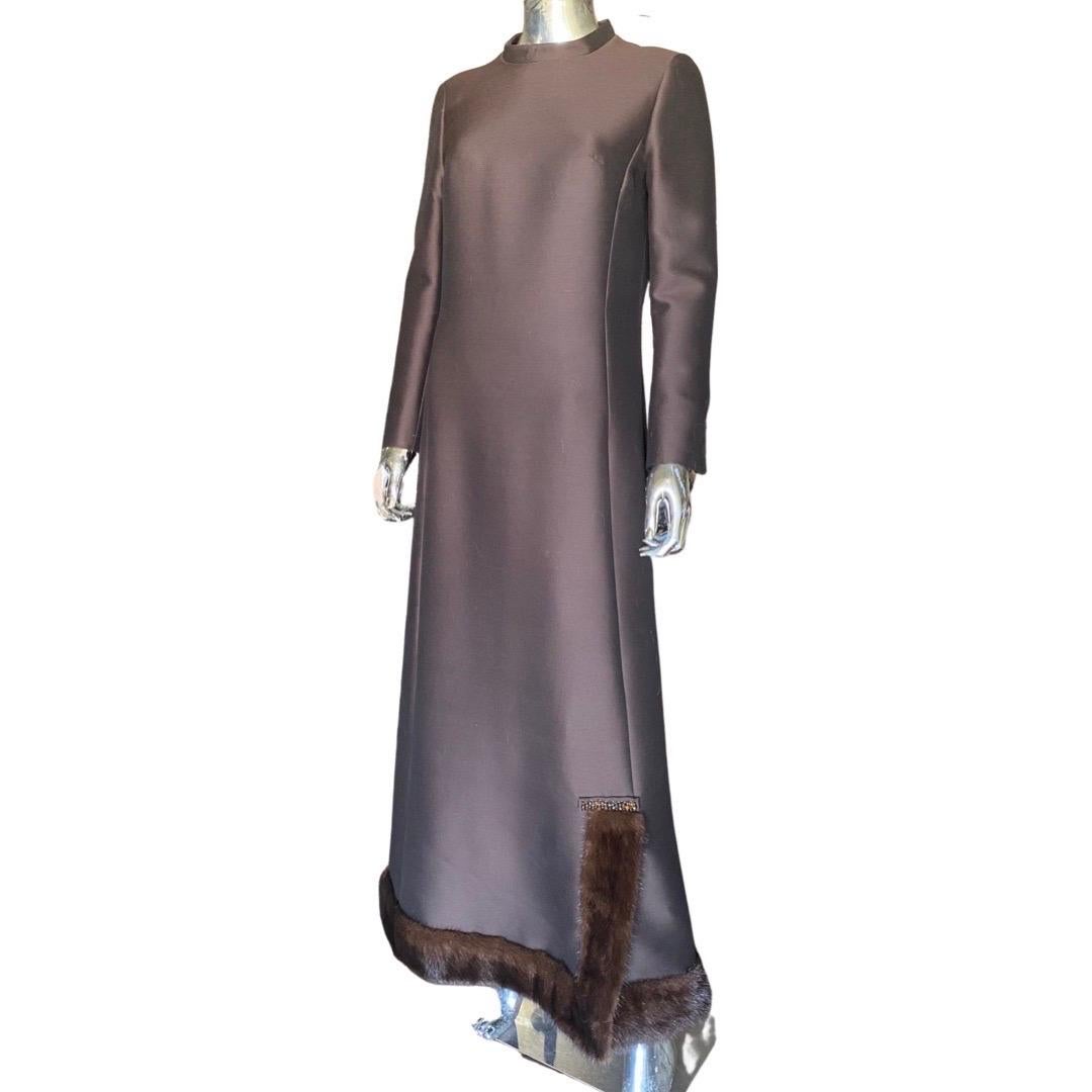 This dress was custom-made in London England for a worldwide traveler who was based in Beverly Hills. This gown has a very modern sculptural quality to it, very much in the spirit of modern Dior, Paris. Size tag has been removed since it was a