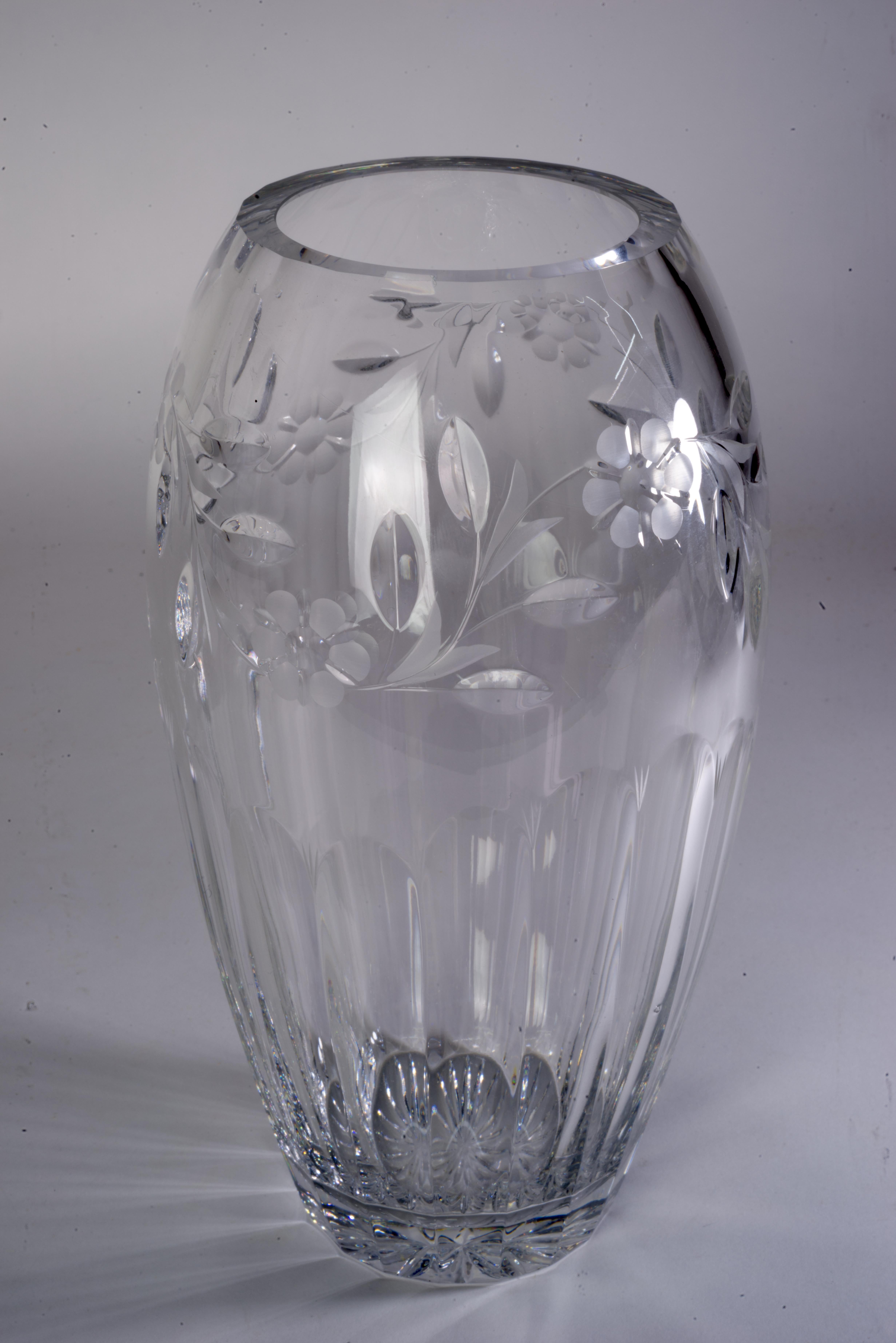  Vintage large cut crystal vase was made by Rogaska in Country Garden pattern. The pattern can be characterized as combination of cut florals and panel designs, and it was in production from 1990 to 2009. The vase stands 10