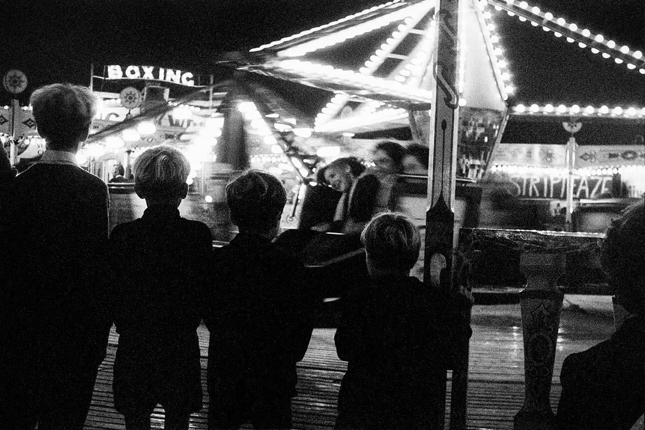 Roger A. Deakins Black and White Photograph - The Boys Night out, Barnstaple Fair