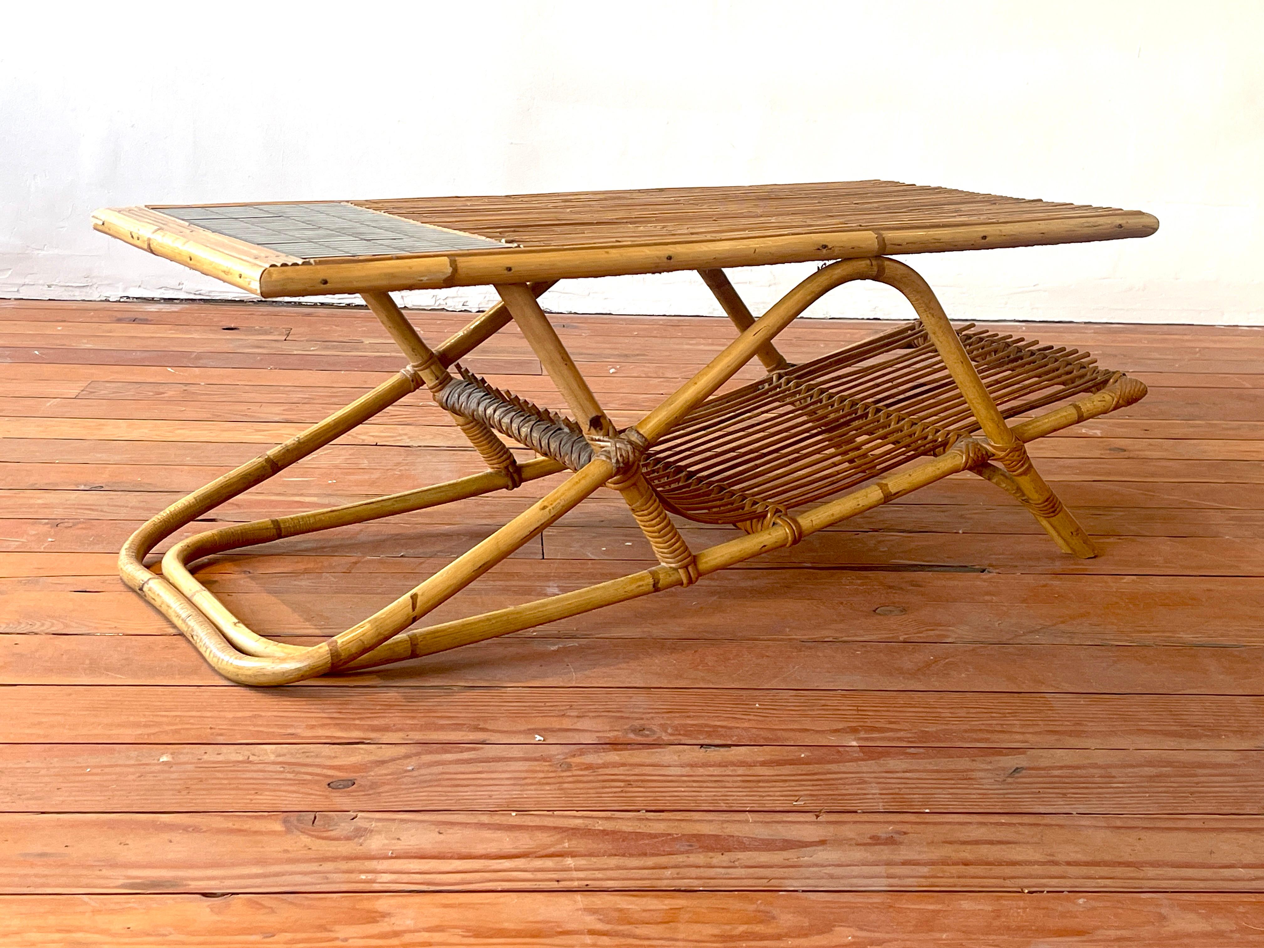 Handsome bamboo coffee table by Roger Capron with black ceramic tiles, bamboo top with floating shelf for magazines or books
Great design