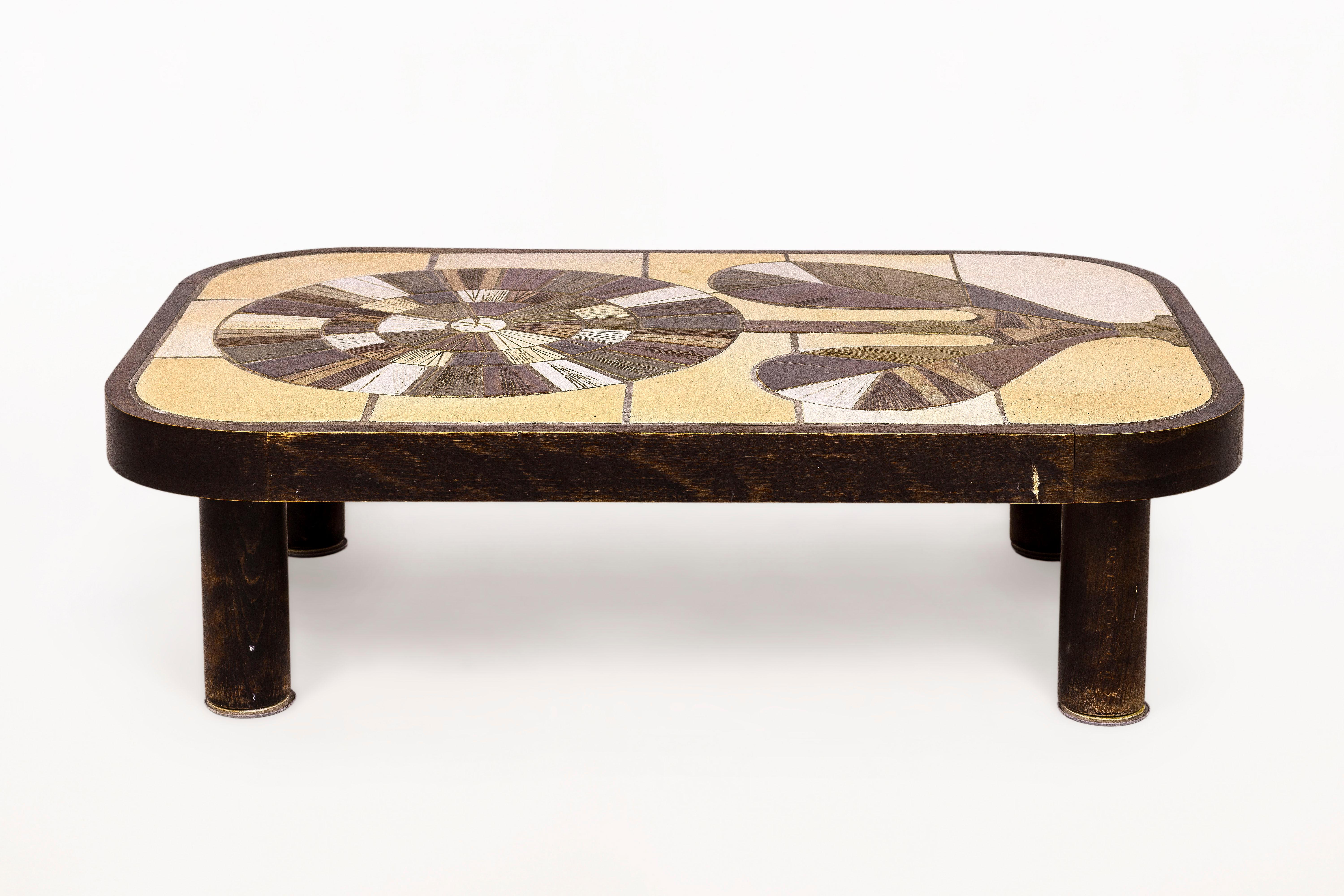 Roger Capron coffee table.
Ceramic coffee table with wooden frame
Iconic Flower Motif
Signed,
circa 1960, France.
Very good vintage condition.
Roger Capron was born in Vincennes, France on September 4, 1922. Interested in drawing, he studied