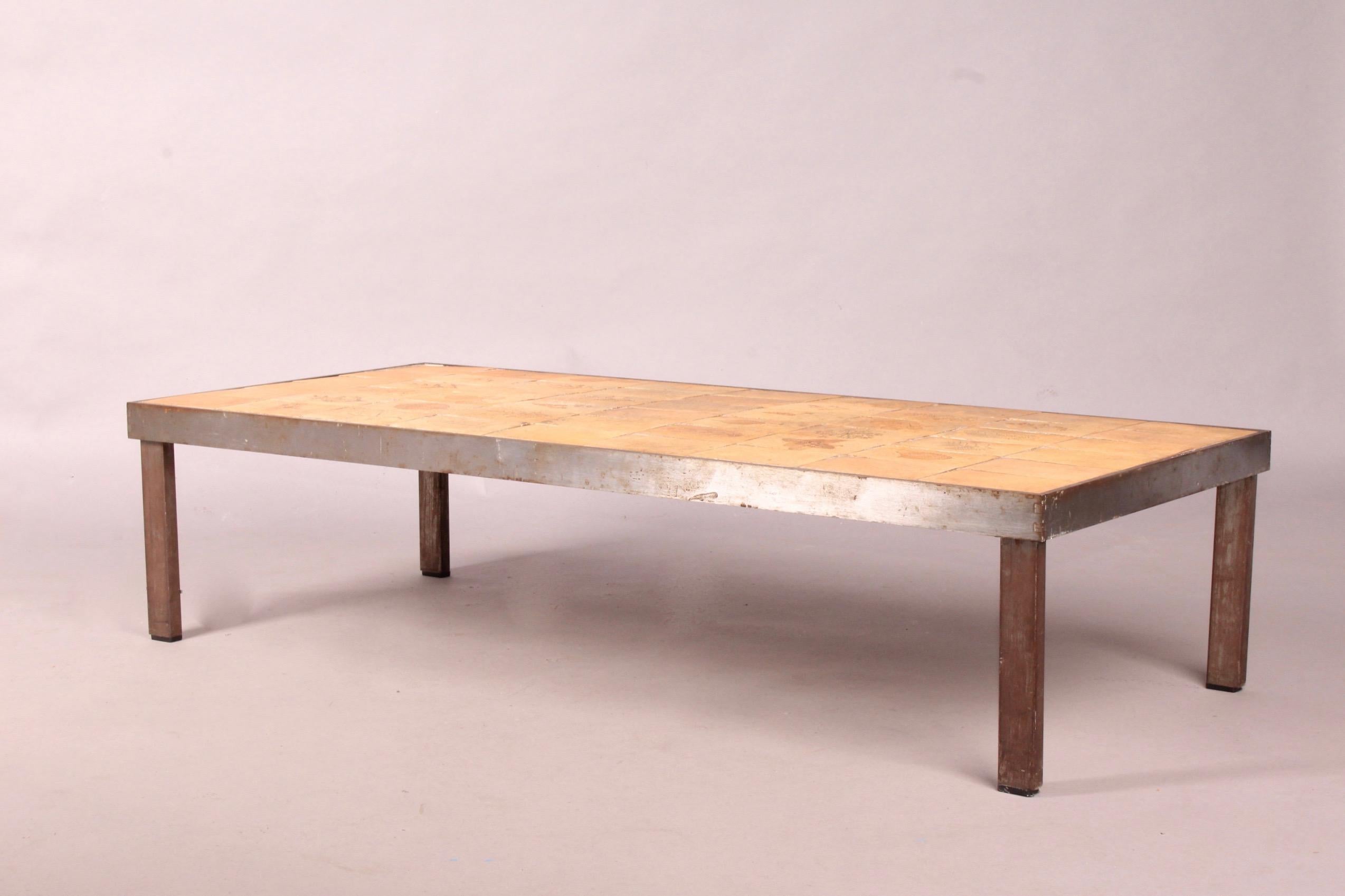Ceramic and metal Roger Capron low table.