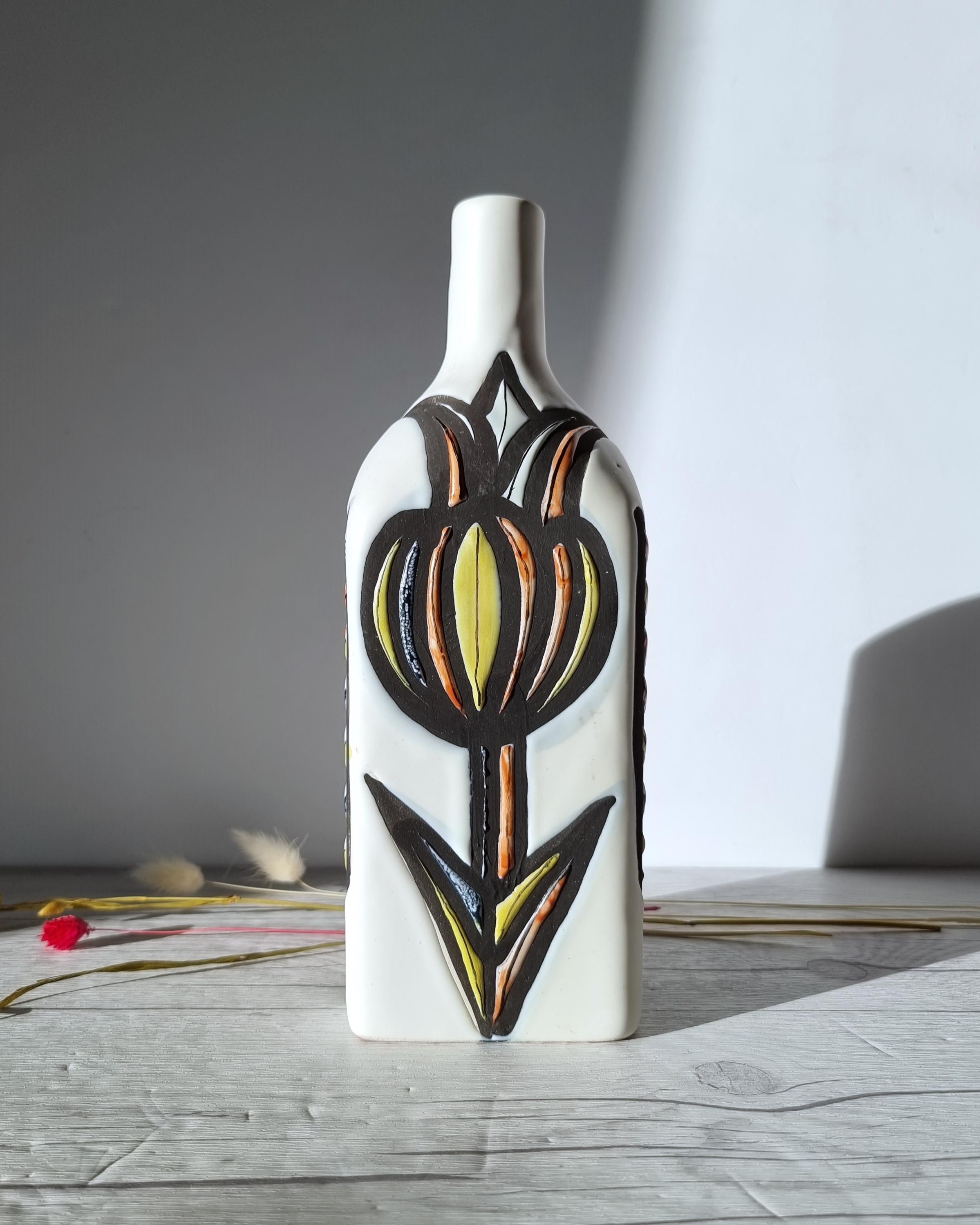 This striking work of Mid-Century Modern design is by Roger Capron (b.1922 - d.2006) for his ceramic studio factory in Vallauris, France. Alongside names such as Picasso, Robert Picault and Jean Derval, Capron was a key contributing figure in the