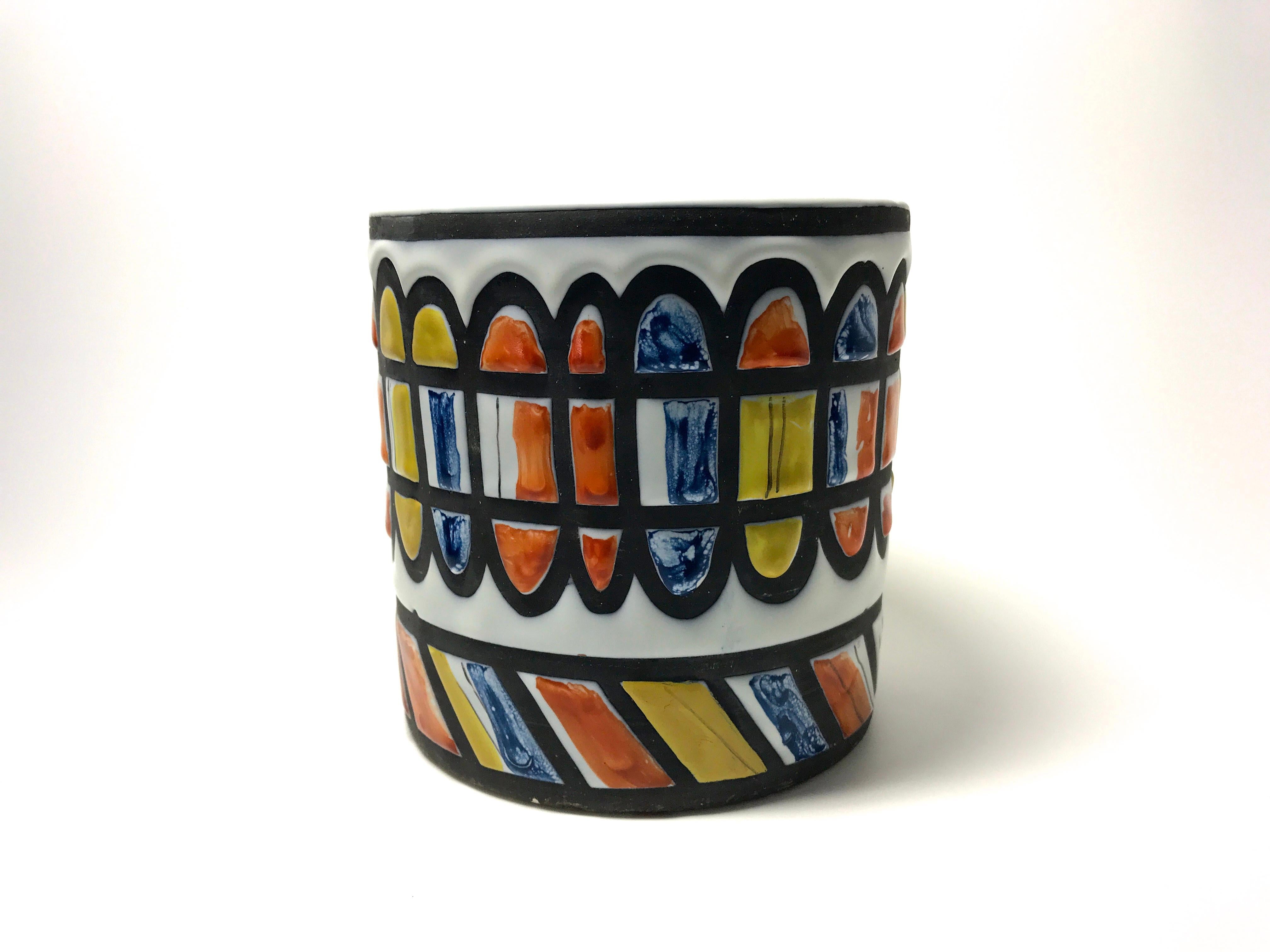 Superbly decorated ceramic cachepot by Roger Capron for Vallauris. The colors used are extremely strong and vibrant making it a striking piece,
circa 1950s
Signed Capron, Vallauris
Measures: Height 5.5 inch, diameter 5 inch
Excellent vibrant