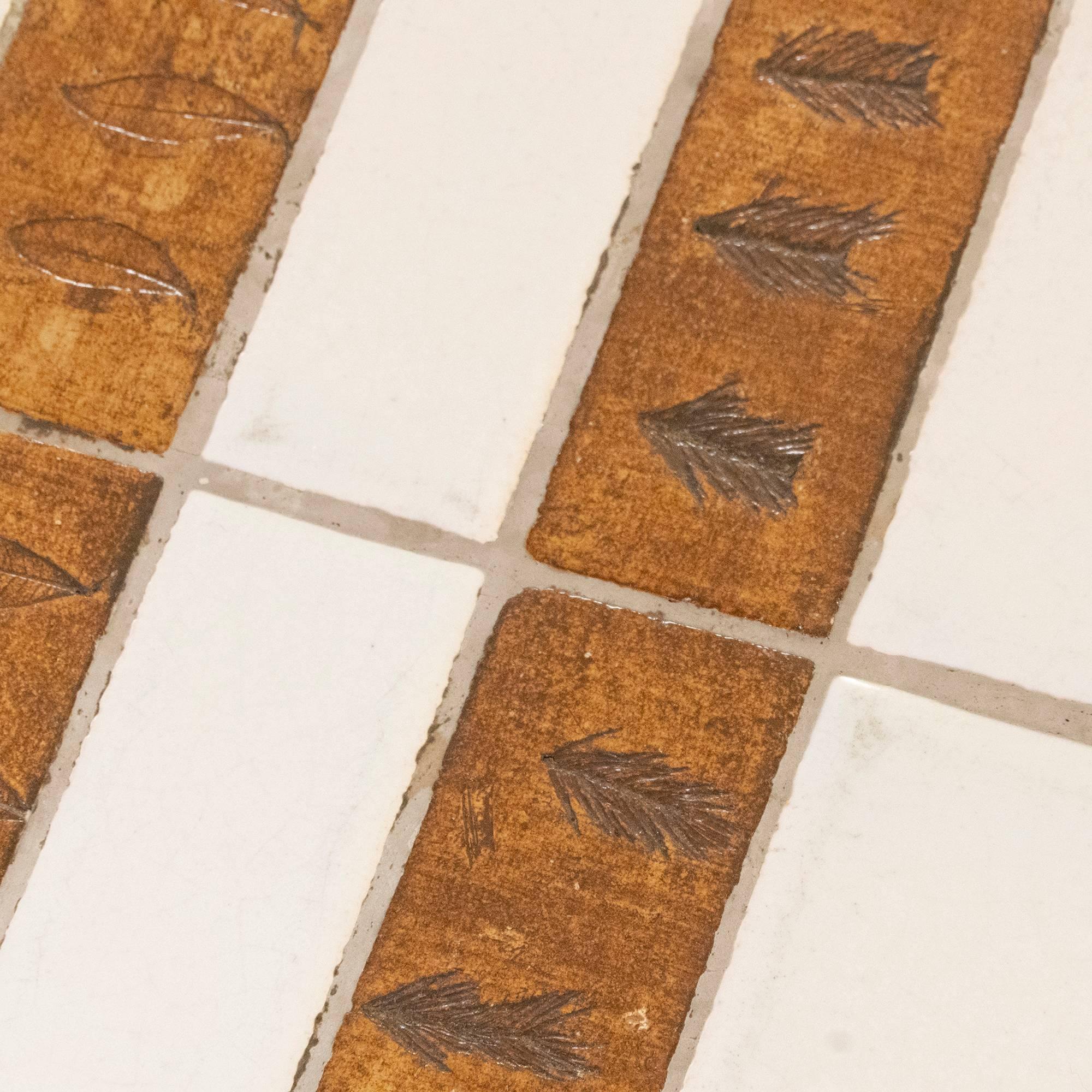 Stoneware tiles top with imprints leaves from the Garrigue series by Roger Capron, original wood structure with perfect vintage patina, France, circa 1960s.